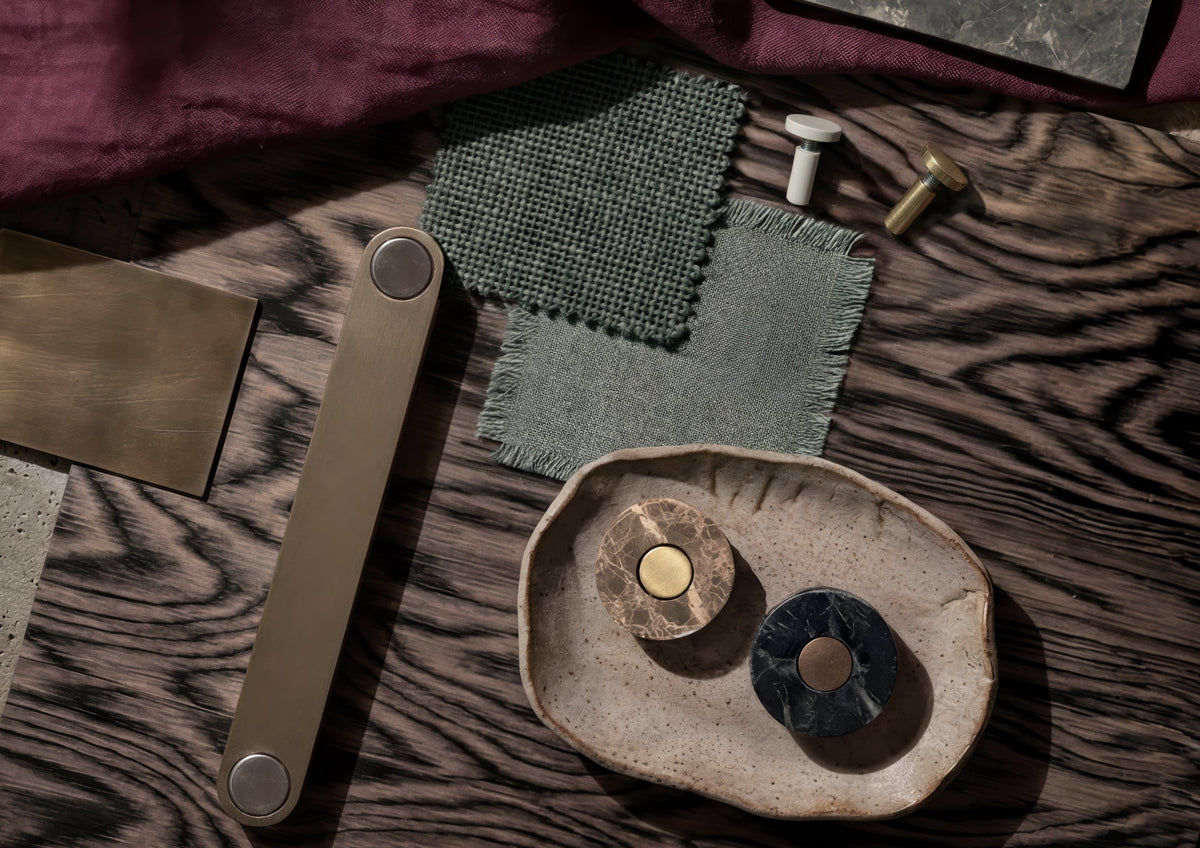 Ensemble cabinet handles in timber, metal and marble by Sloan Roberts