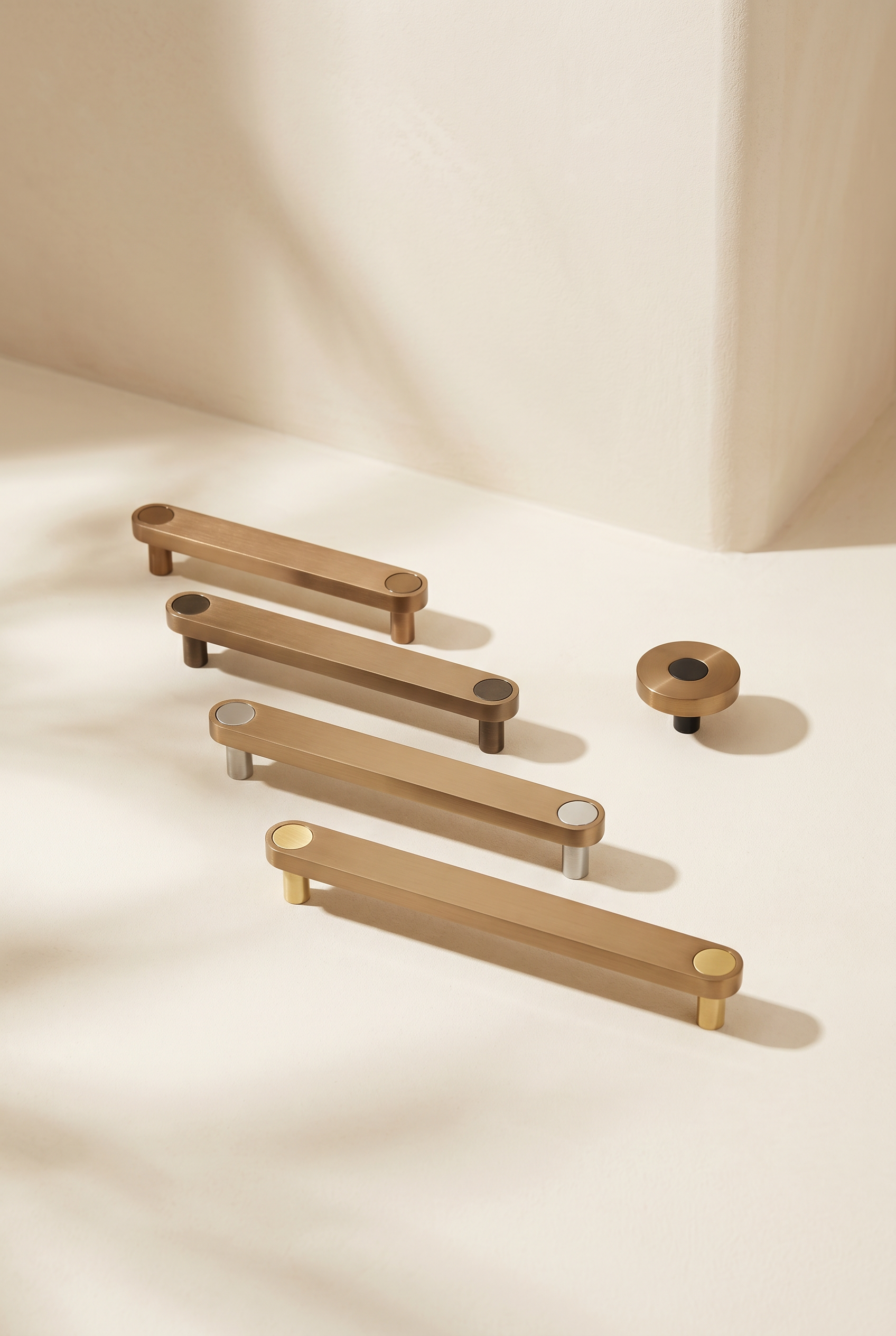 Ensemble Brushed Copper Handle — modular cabinet handle by Sloan Roberts. Warm brushed copper finish, available as knob or bar in four sizes with choice of button detail. Designed and assembled in Melbourne.