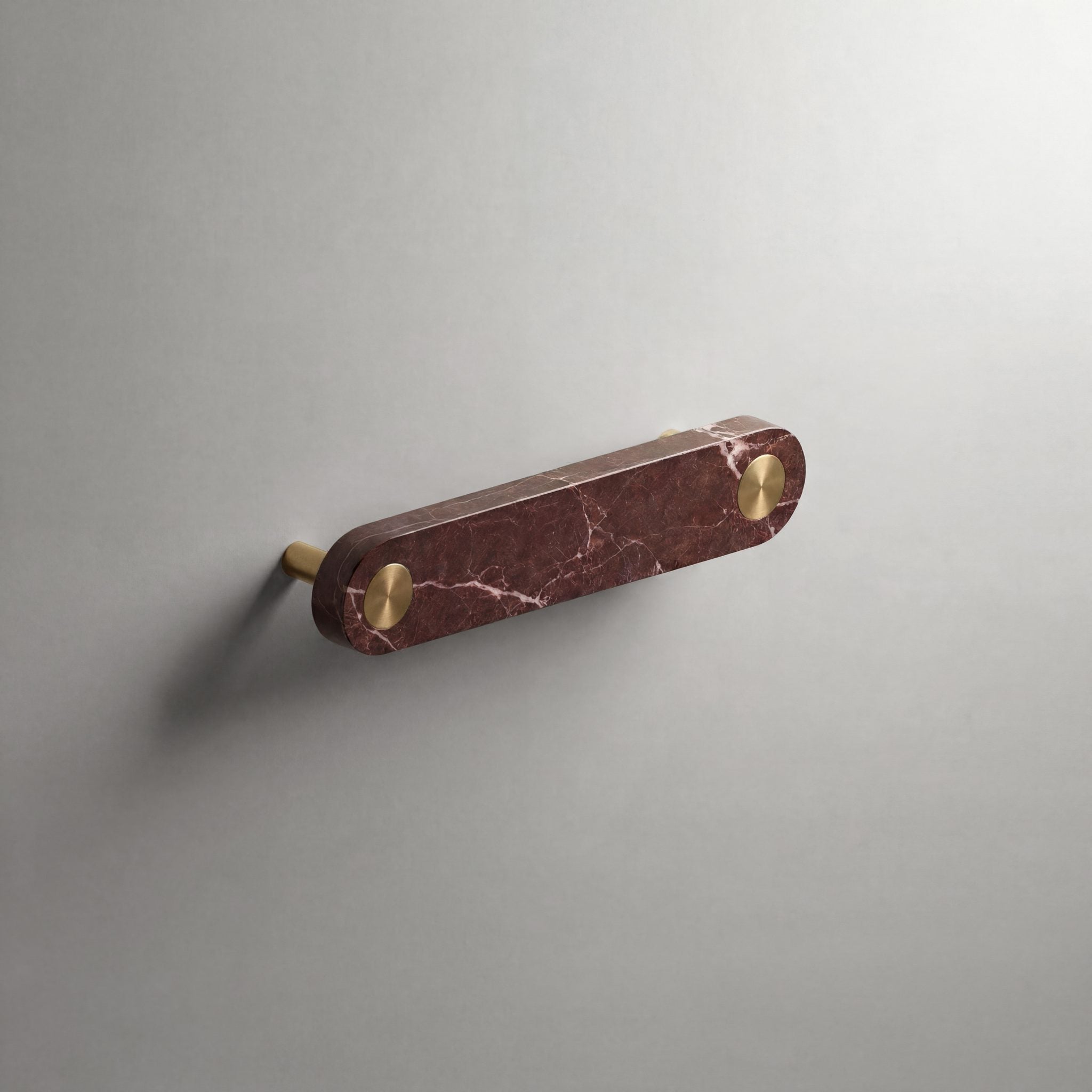 Red Marble Ensemble Handle in 128mm Centres with Brass button detail by Sloan Roberts.