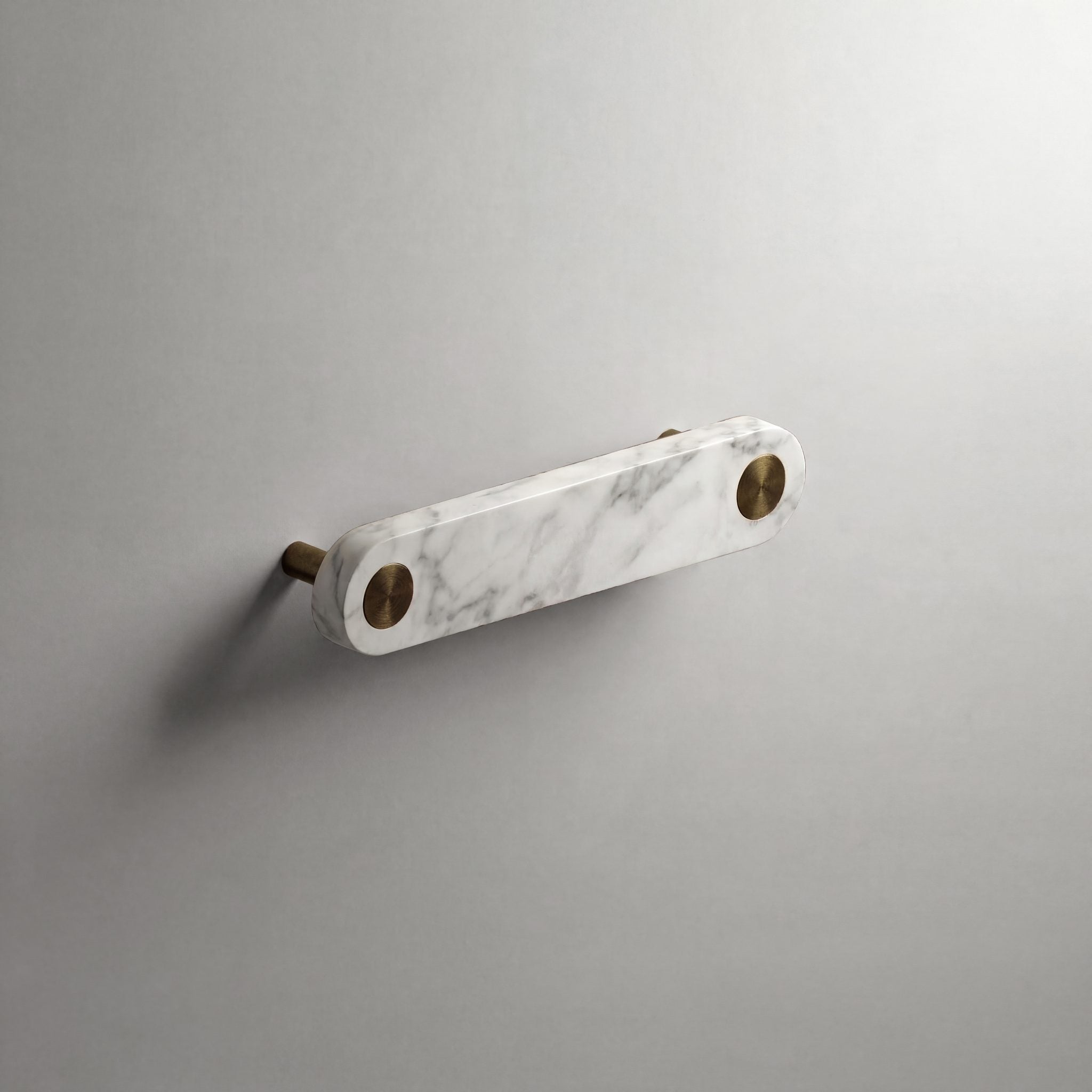 White Marble Ensemble Handle in 128mm Centres with Aged Bronze button detail by Sloan Roberts.