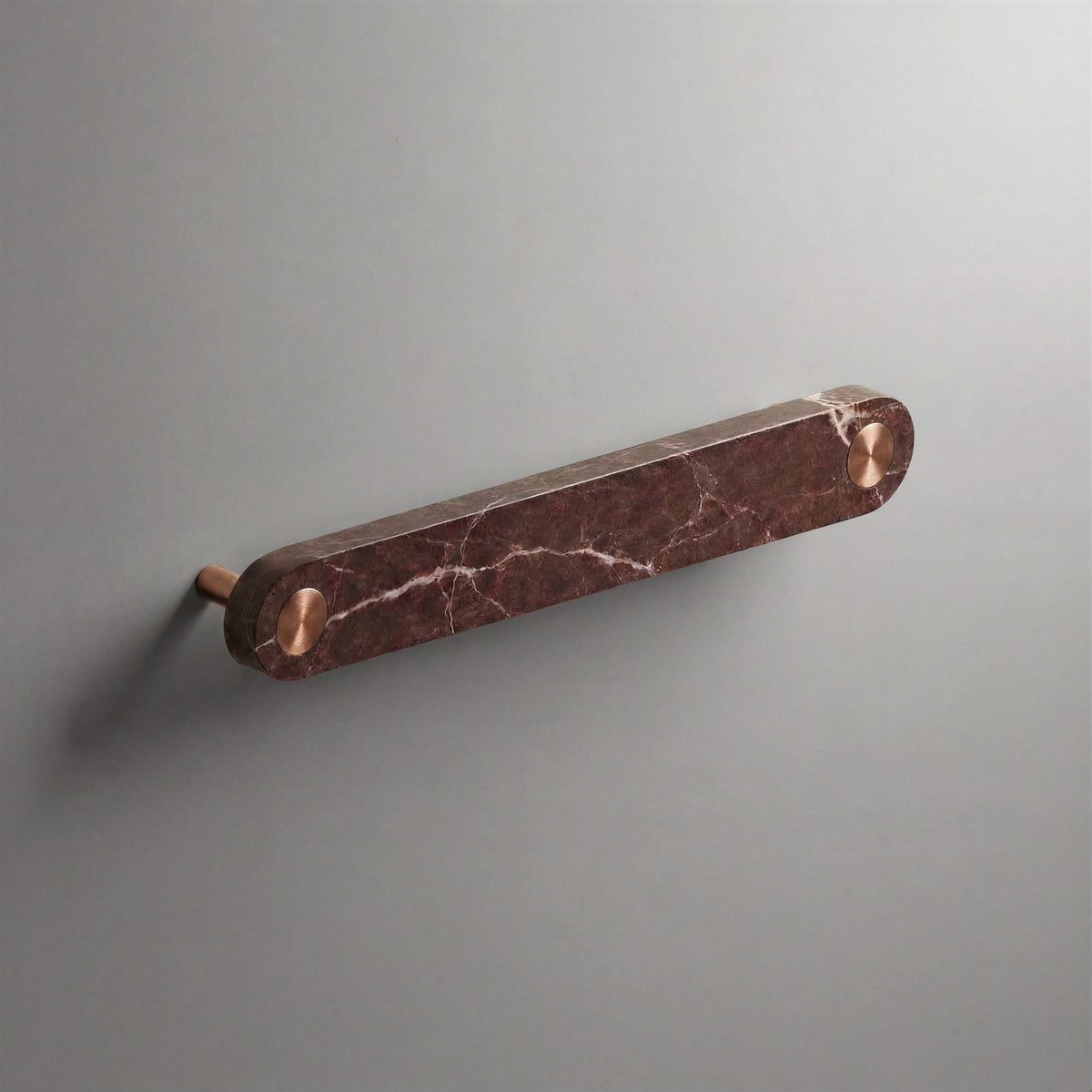 Red Marble Ensemble Handle in 160mm Centres with Brushed Copper button detail by Sloan Roberts.