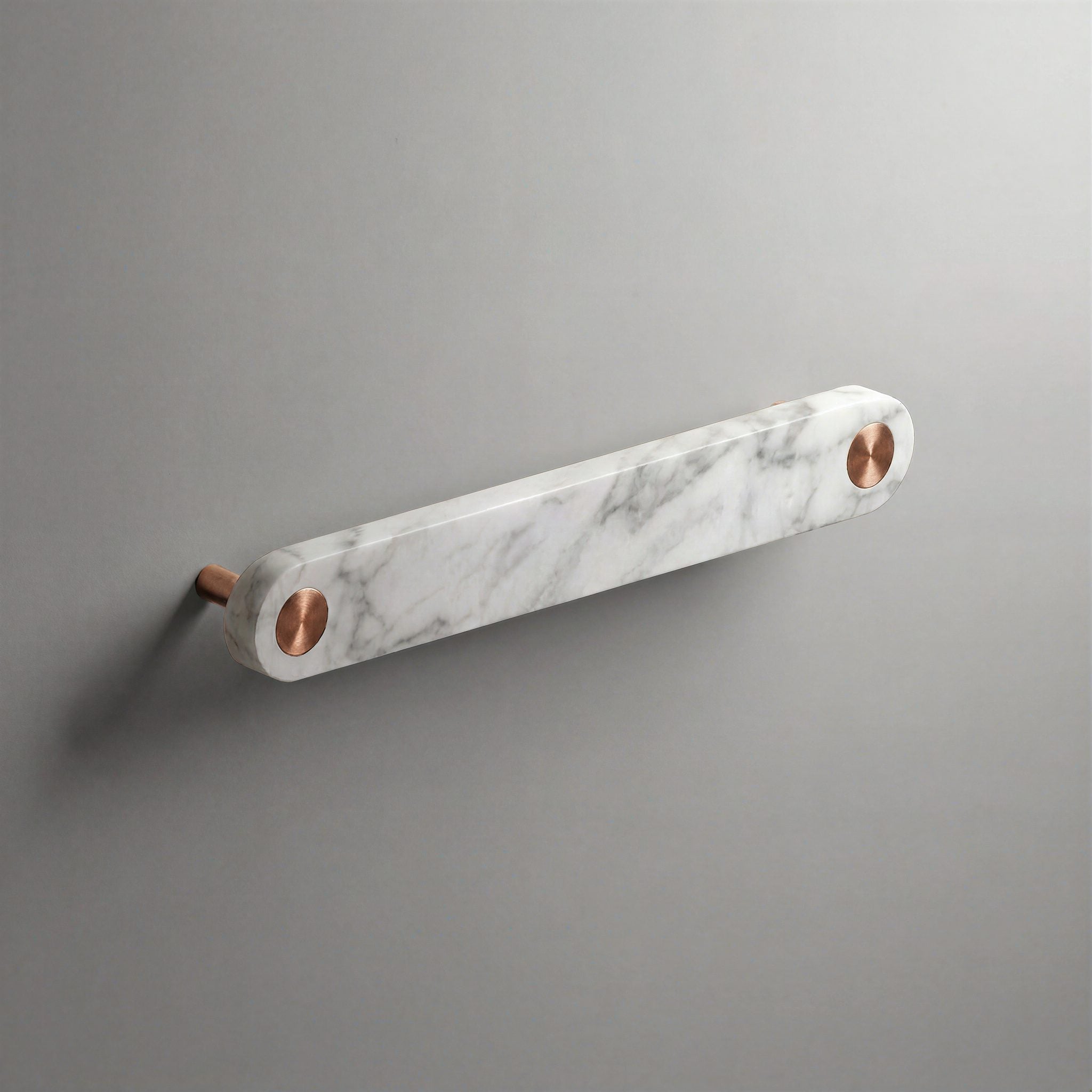 White Marble Ensemble Handle in 160mm Centres with Brushed Copper button detail by Sloan Roberts.
