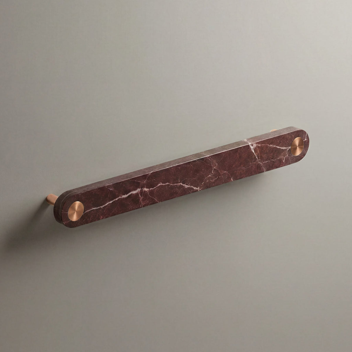 Red Marble Ensemble Handle in 192mm Centres with Brushed Copper button detail by Sloan Roberts.