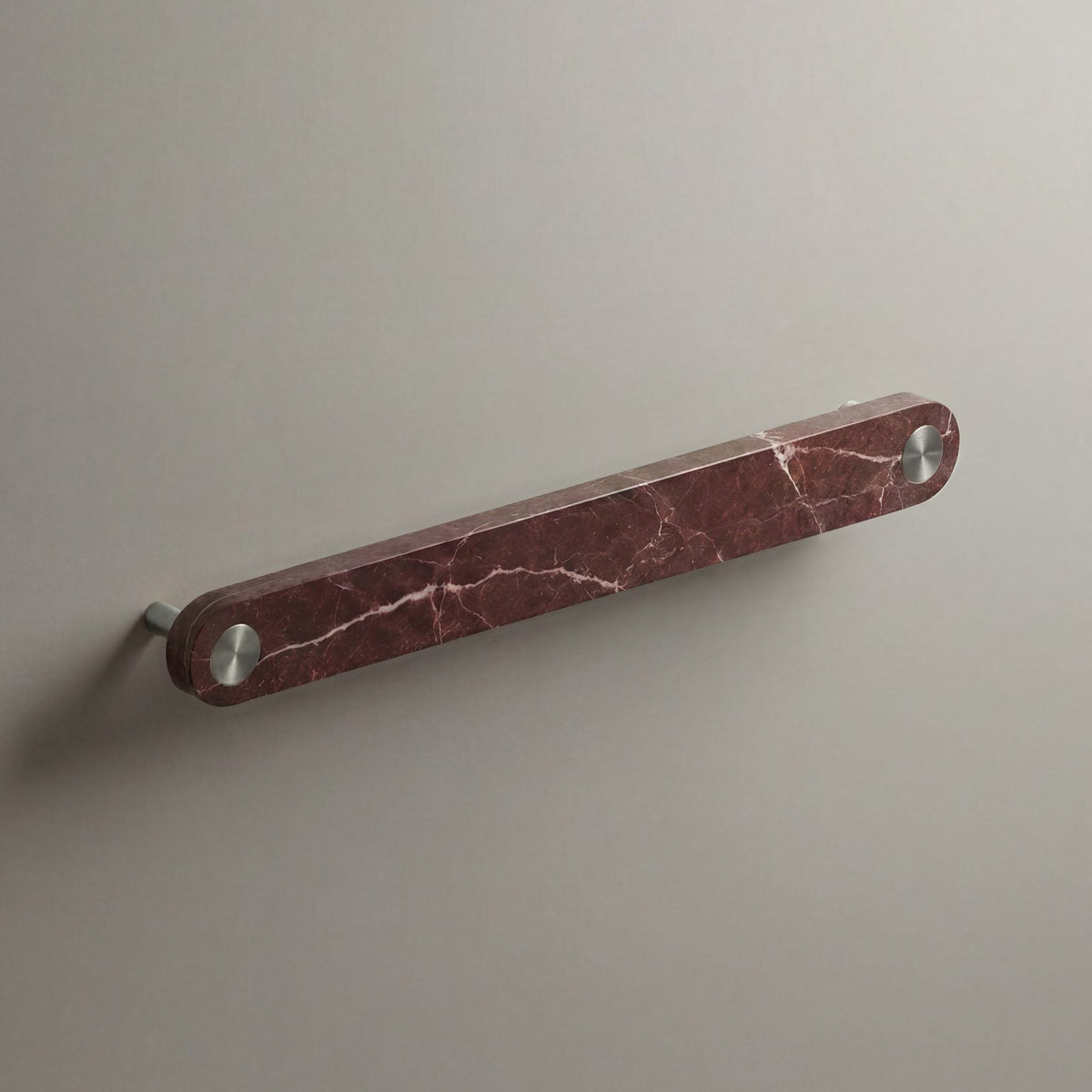 Red Marble Ensemble Handle in 192mm Centres with Brushed Steel button detail by Sloan Roberts.