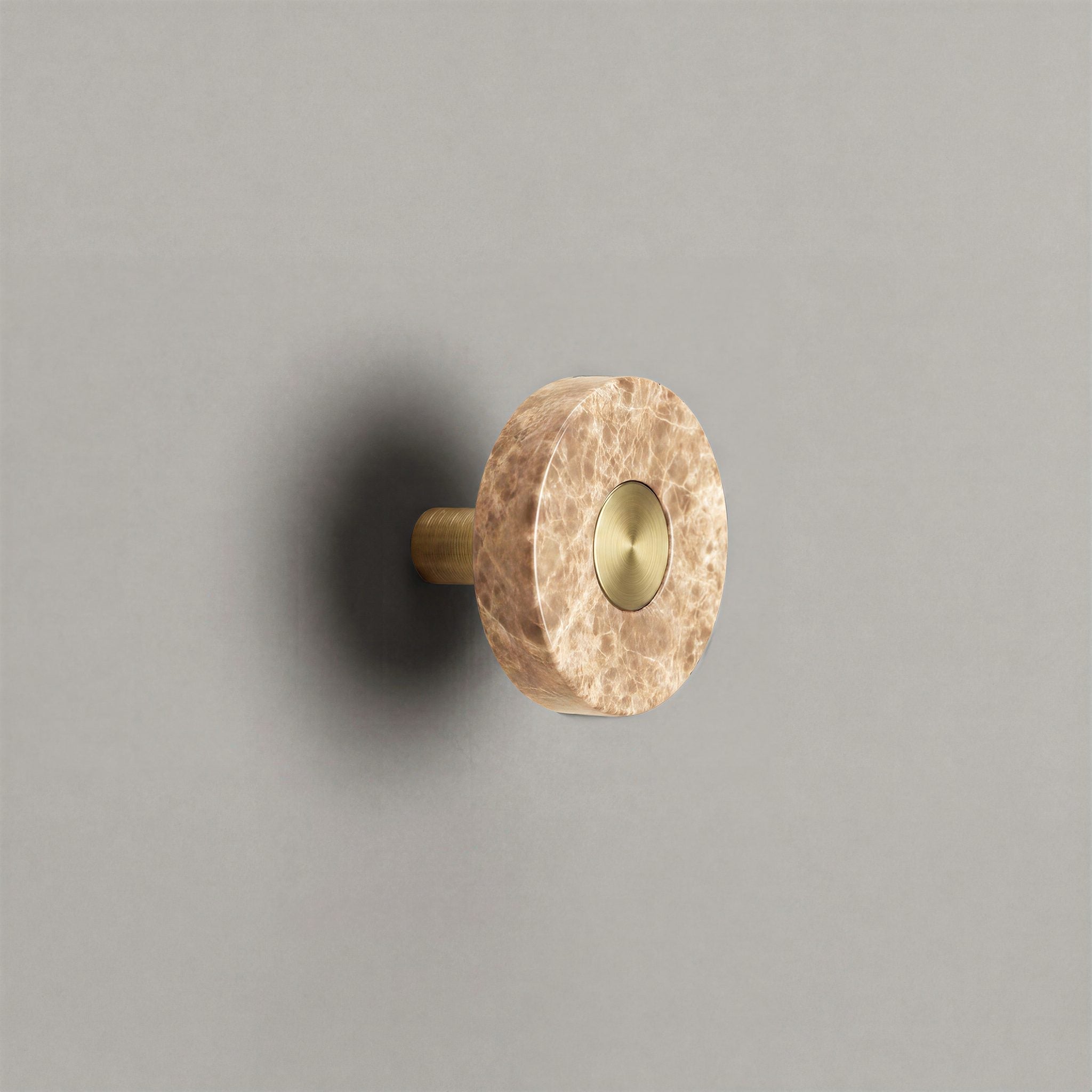 Latte Marble Ensemble Handle in Knob size with Brass button detail by Sloan Roberts.