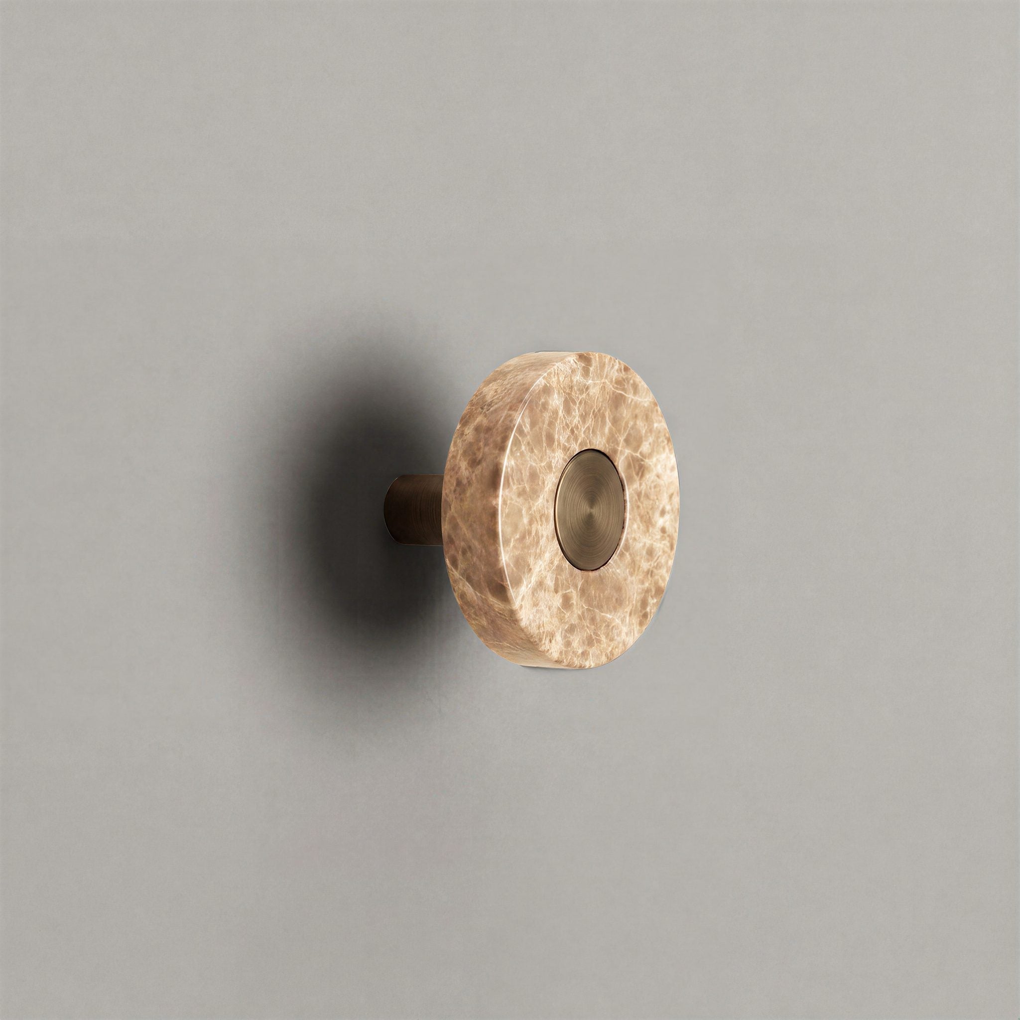 Latte Marble Ensemble Handle in Knob size with Aged Bronze button detail by Sloan Roberts.