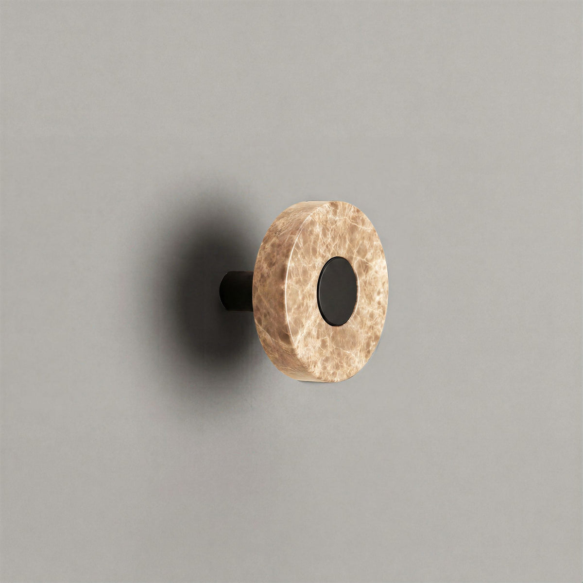 Latte Marble Ensemble Handle in Knob size with Matte Black button detail by Sloan Roberts.