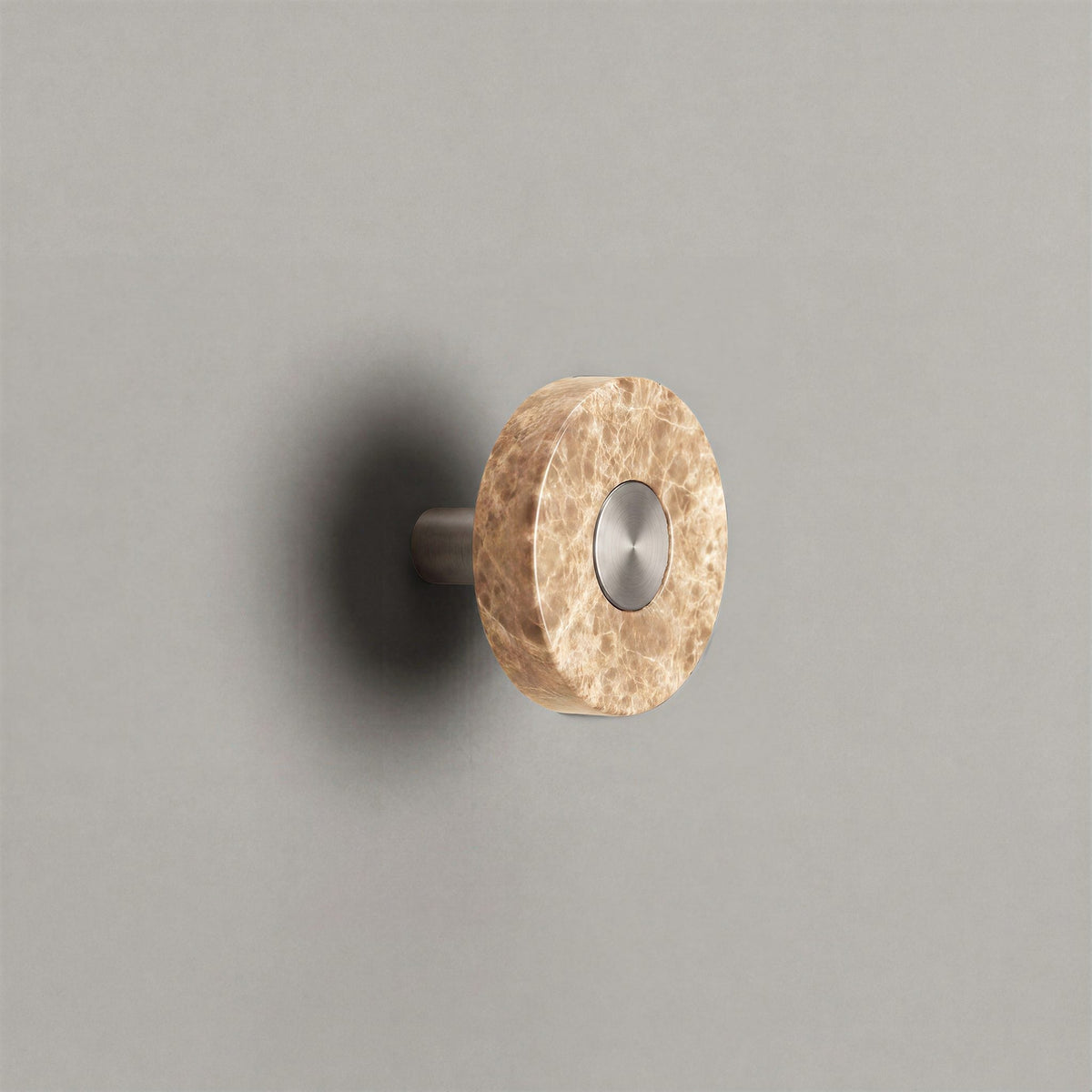 Latte Marble Ensemble Handle in Knob size with Brushed Steel button detail by Sloan Roberts.
