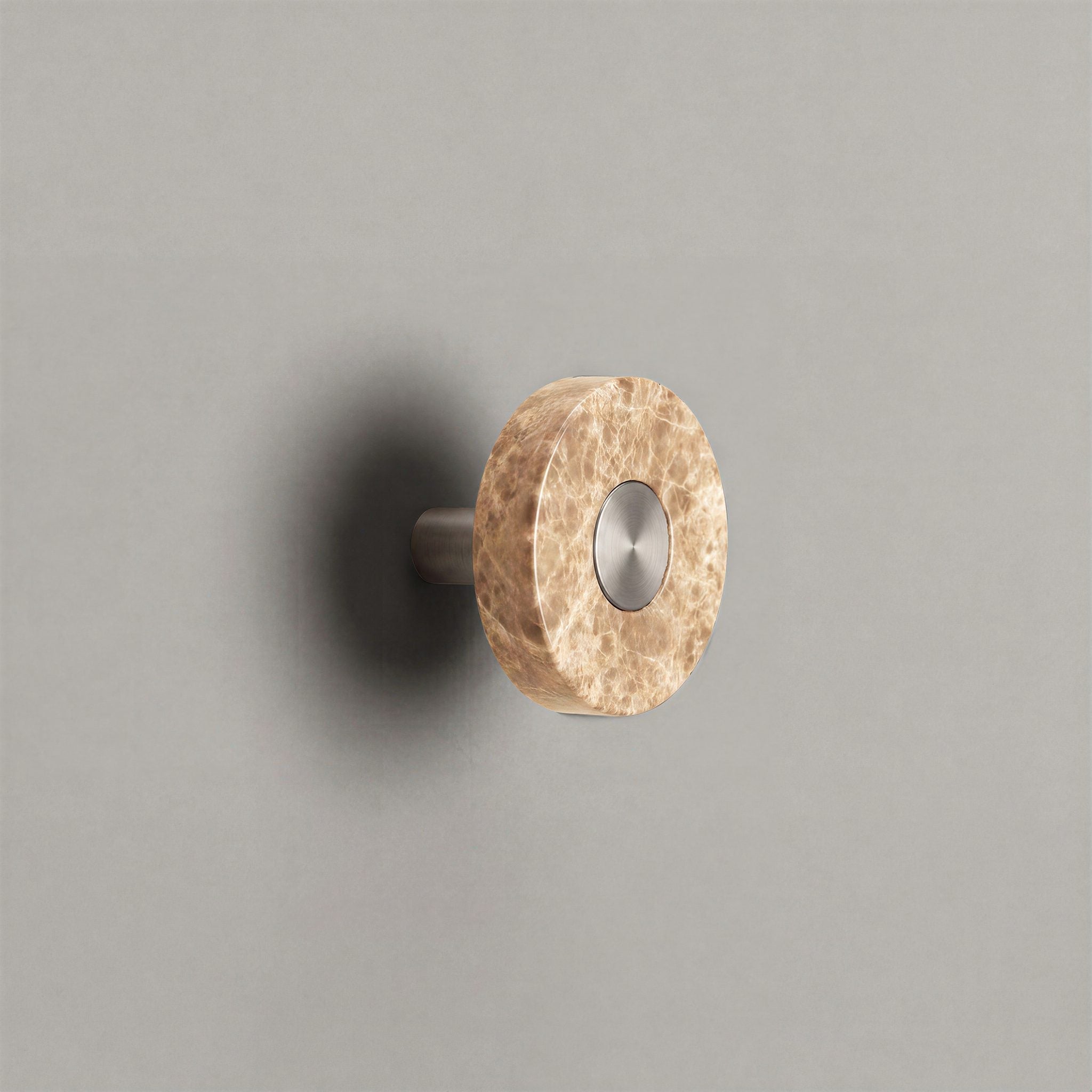 Latte Marble Ensemble Handle in Knob size with Brushed Steel button detail by Sloan Roberts.