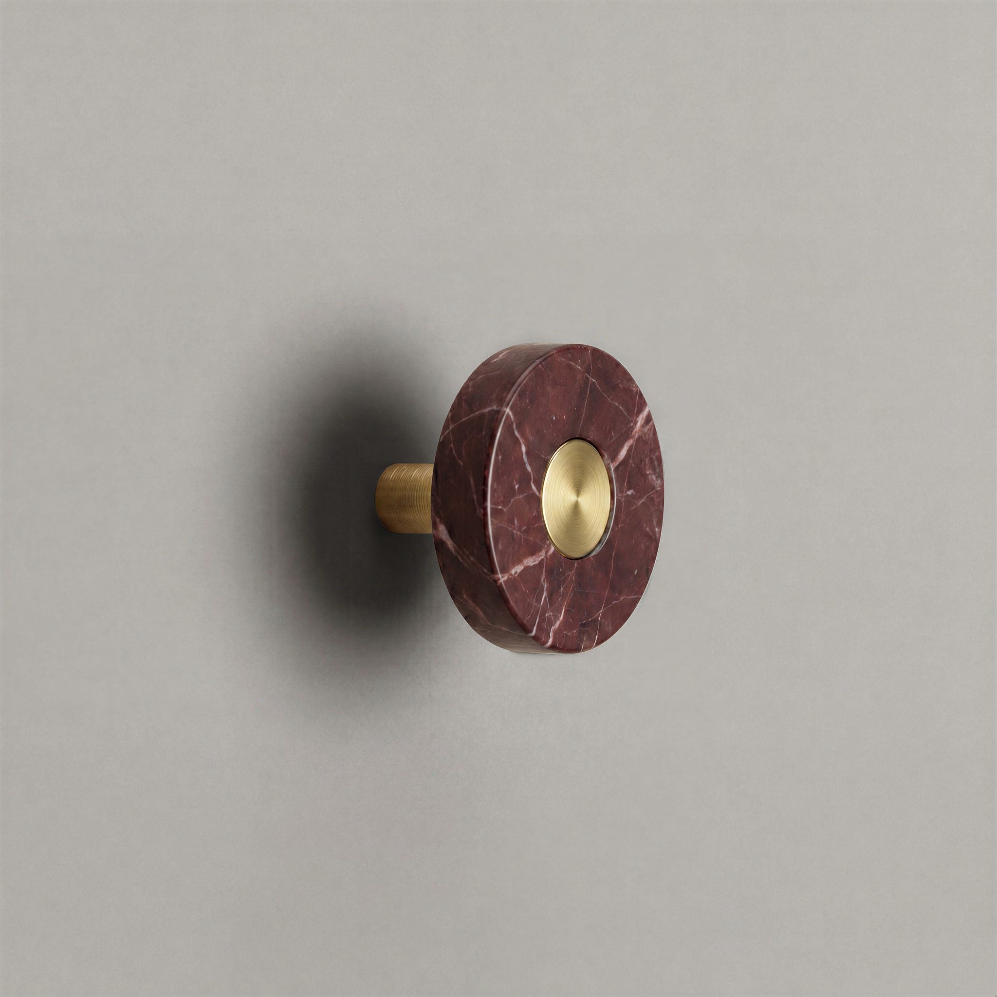 Red Marble Ensemble Handle in Knob size with Brass button detail by Sloan Roberts.