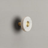 White Marble Ensemble Handle in Knob size with Brass button detail by Sloan Roberts.