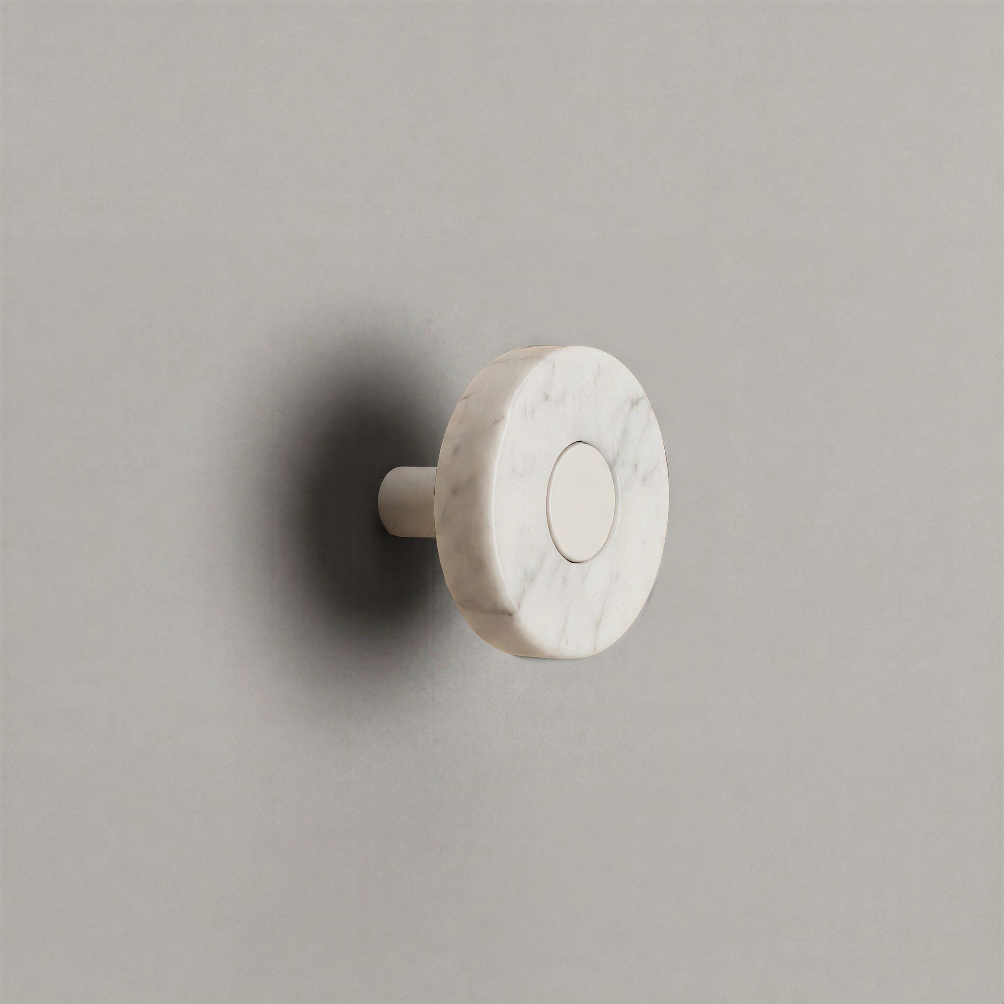 White Marble Ensemble Handle in Knob size with Matte White button detail by Sloan Roberts.