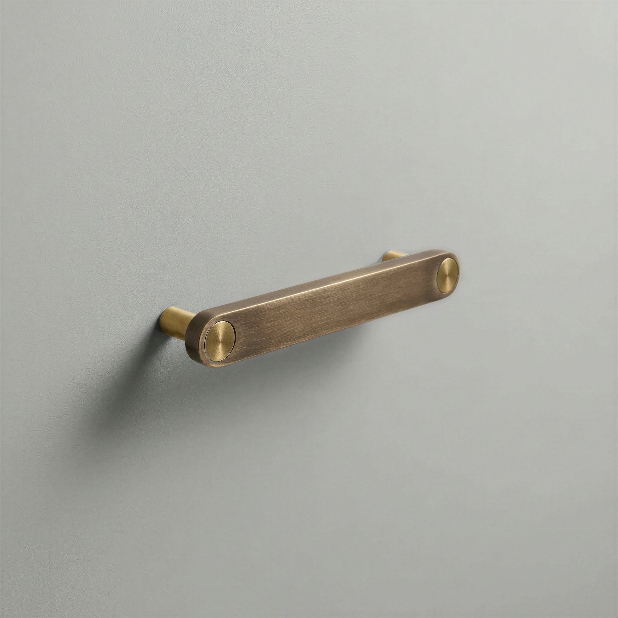 Aged Bronze Ensemble Handle in 128mm Centres with Brass button detail by Sloan Roberts.