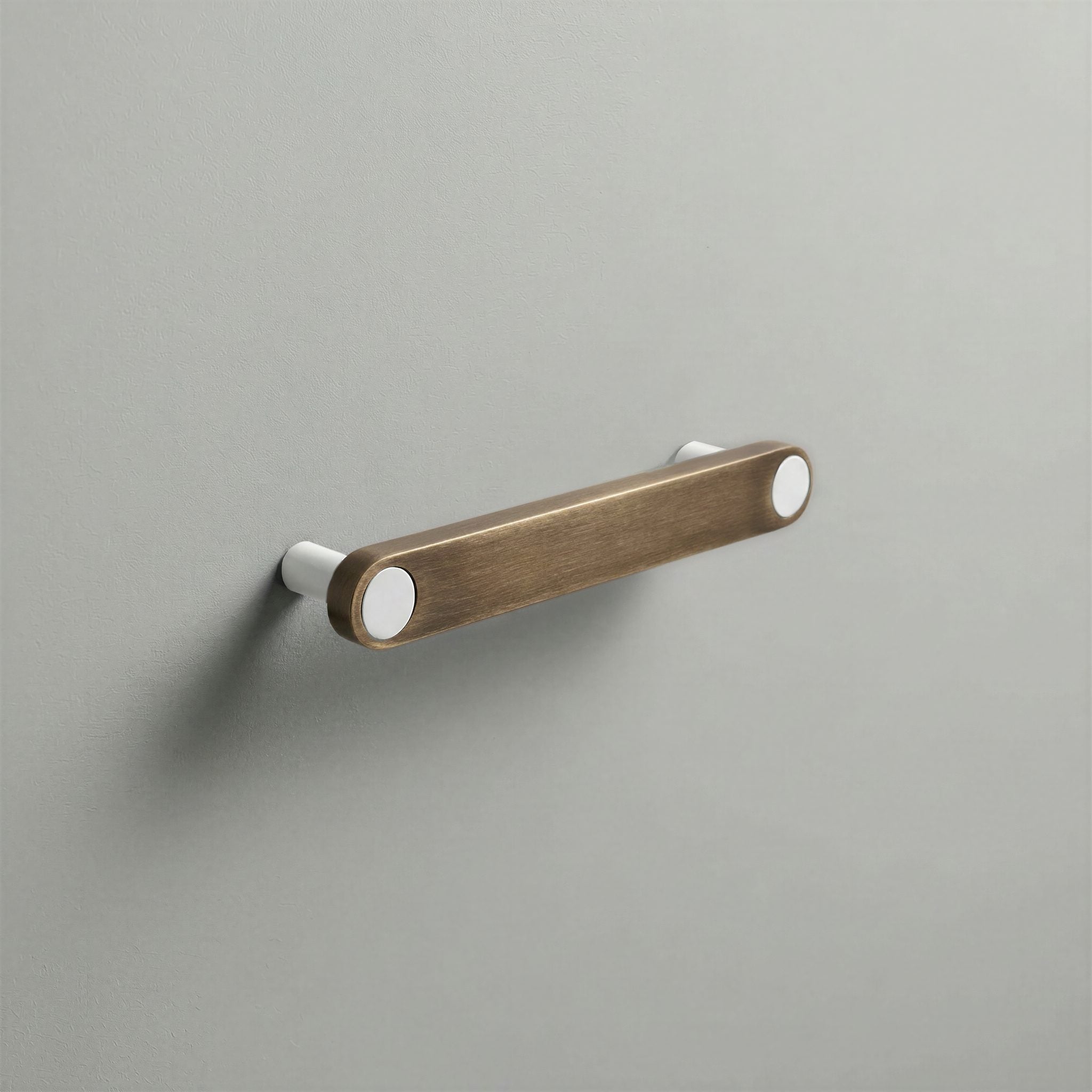 Aged Bronze Ensemble Handle in 128mm Centres with Matte White button detail by Sloan Roberts.