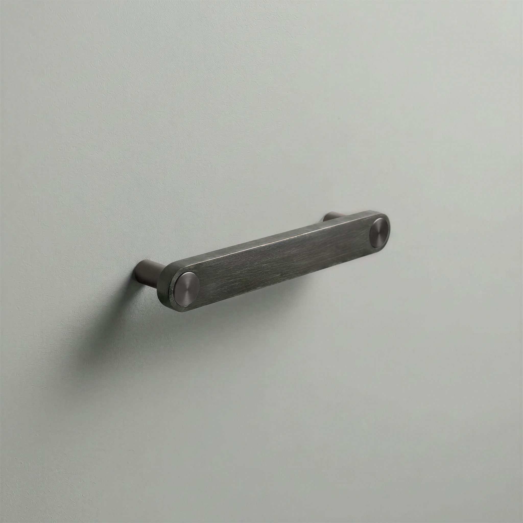 Gunmetal Ensemble Handle in 128mm Centres with Gunmetal button detail by Sloan Roberts.