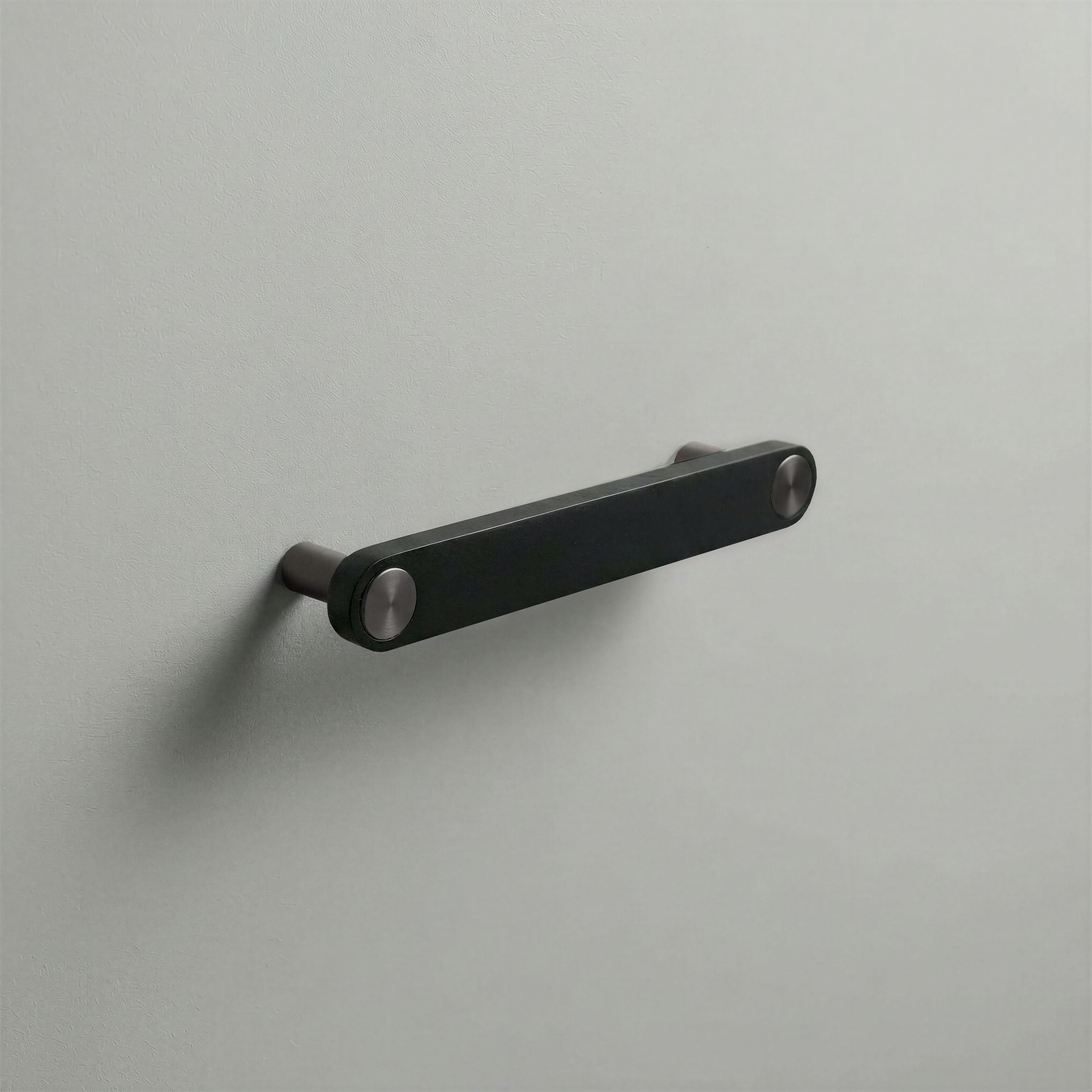 Matte Black Ensemble Handle in 128mm Centres with Gunmetal button detail by Sloan Roberts.