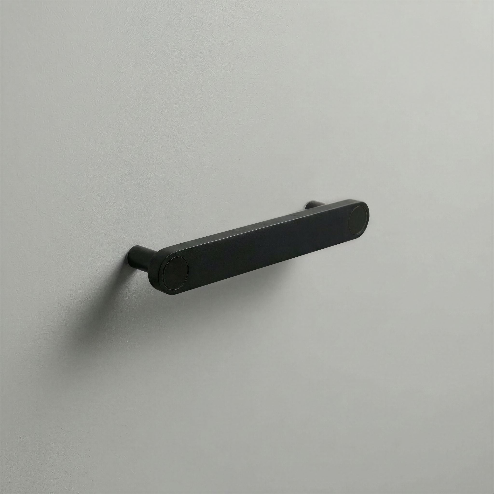 Matte Black Ensemble Handle in 128mm Centres with Matte Black button detail by Sloan Roberts.