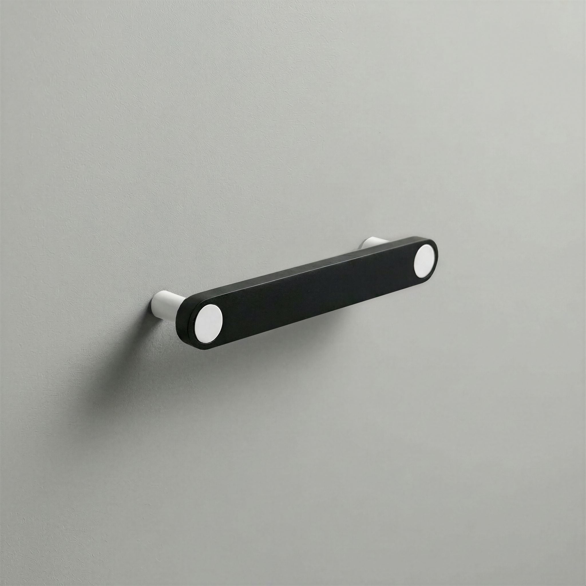 Matte Black Ensemble Handle in 128mm Centres with Matte White button detail by Sloan Roberts.