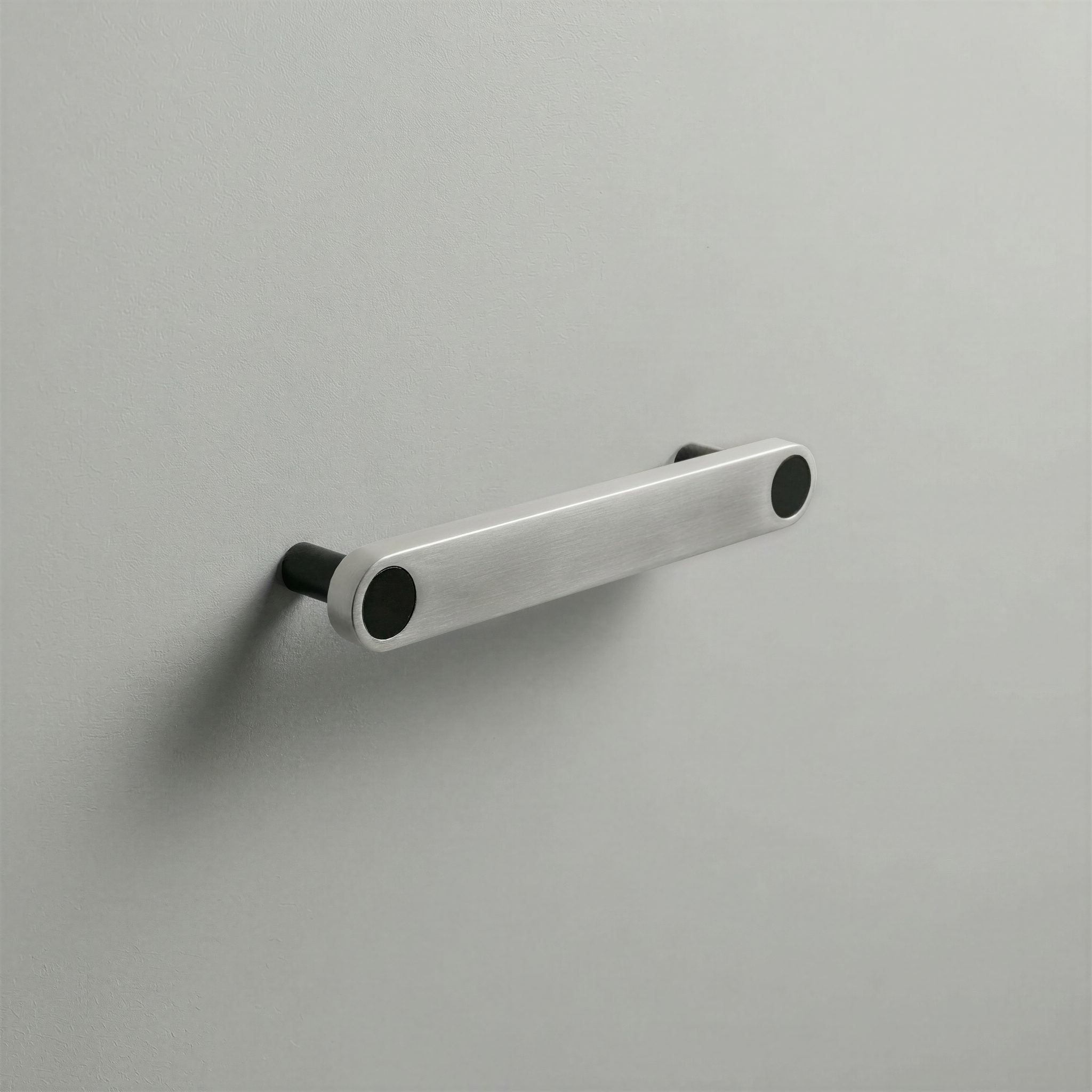 Brushed Steel Ensemble Handle in 128mm Centres with Matte Black button detail by Sloan Roberts.