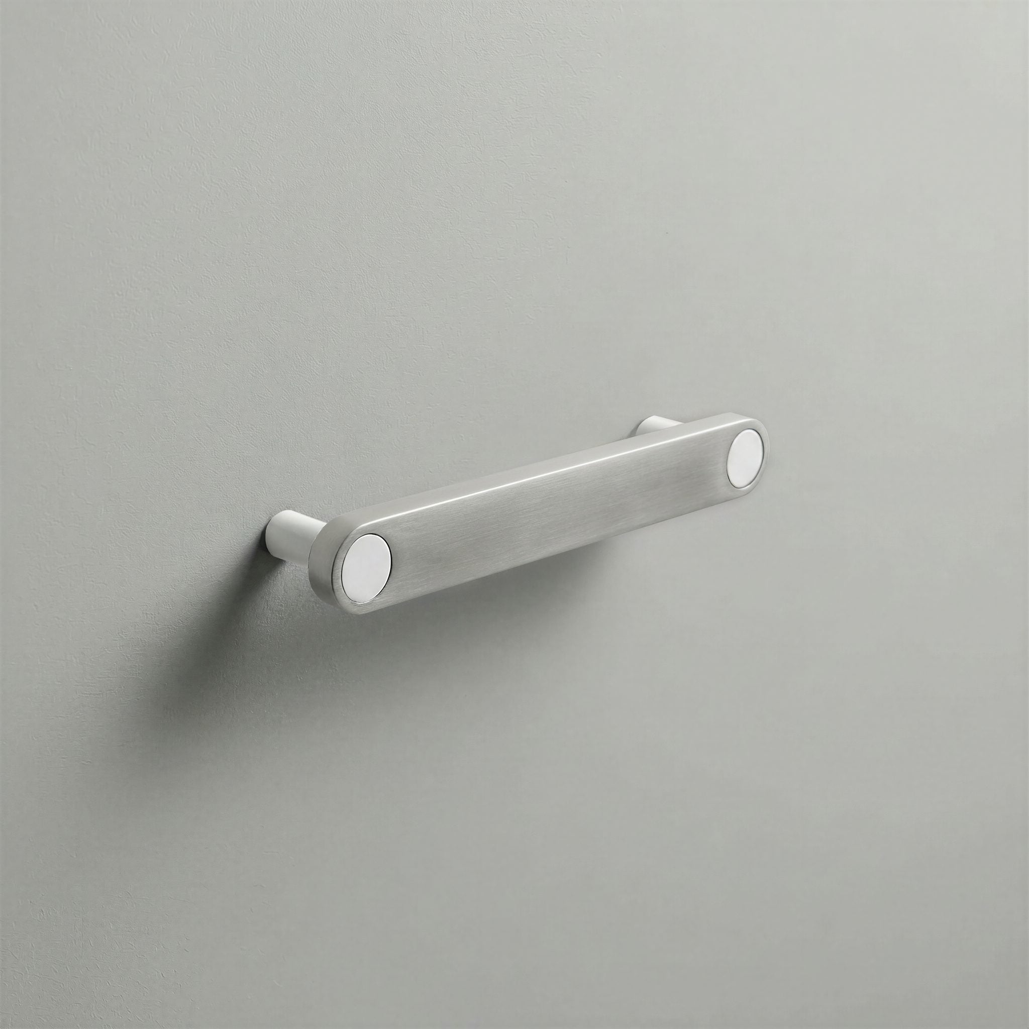 Brushed Steel Ensemble Handle in 128mm Centres with Matte White button detail by Sloan Roberts.