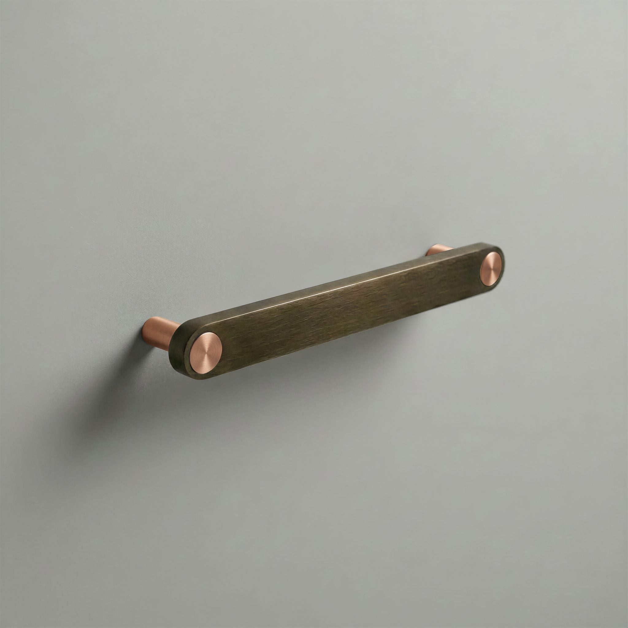 Aged Bronze Ensemble Handle in 160mm Centres with Brushed Copper button detail by Sloan Roberts.