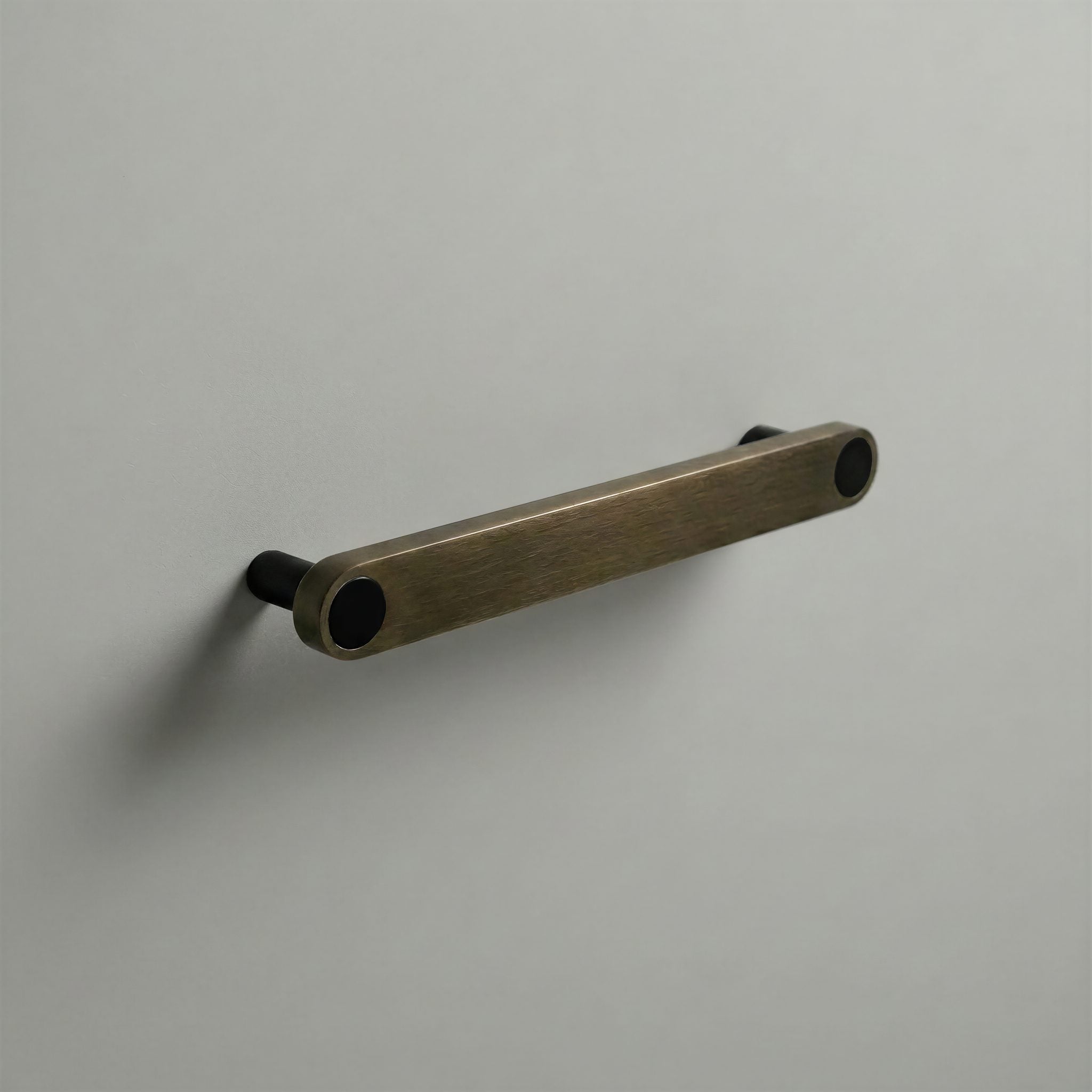 Aged Bronze Ensemble Handle in 160mm Centres with Matte Black button detail by Sloan Roberts.