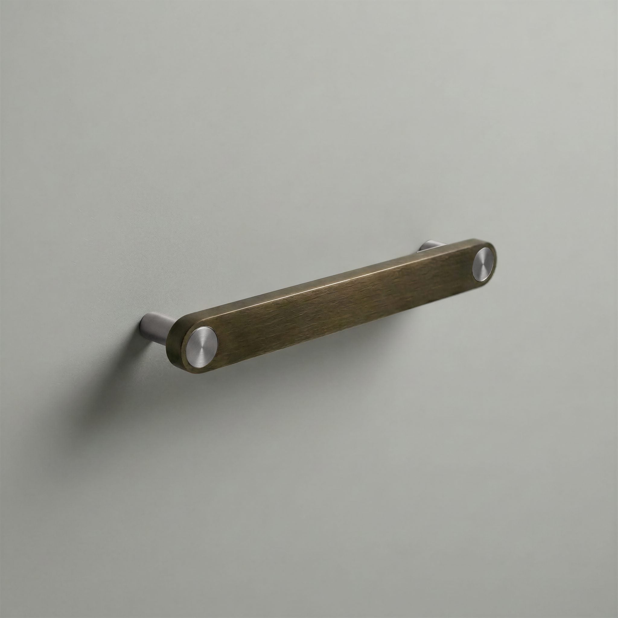 Aged Bronze Ensemble Handle in 160mm Centres with Brushed Steel button detail by Sloan Roberts.