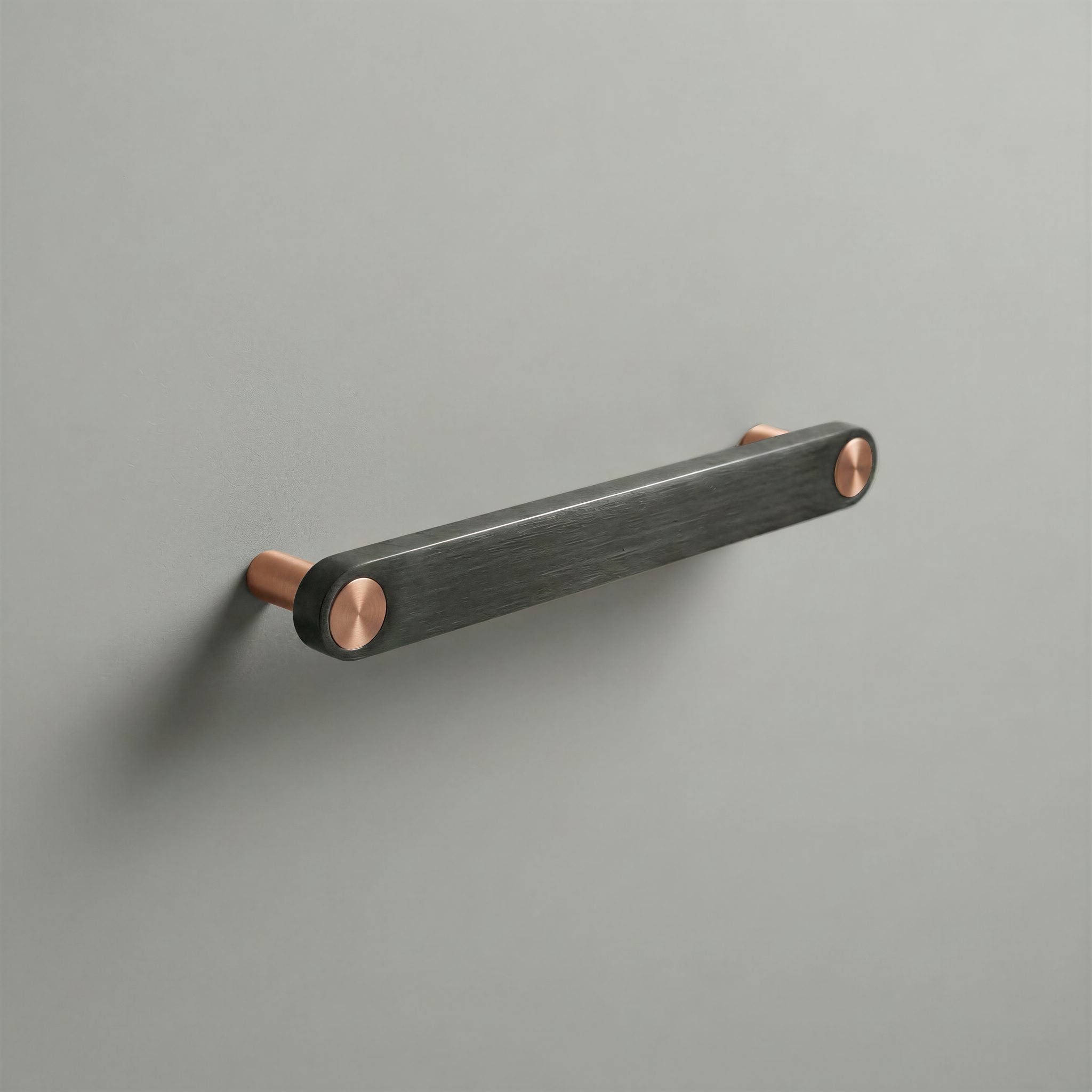 Gunmetal Ensemble Handle in 160mm Centres with Brushed Copper button detail by Sloan Roberts.