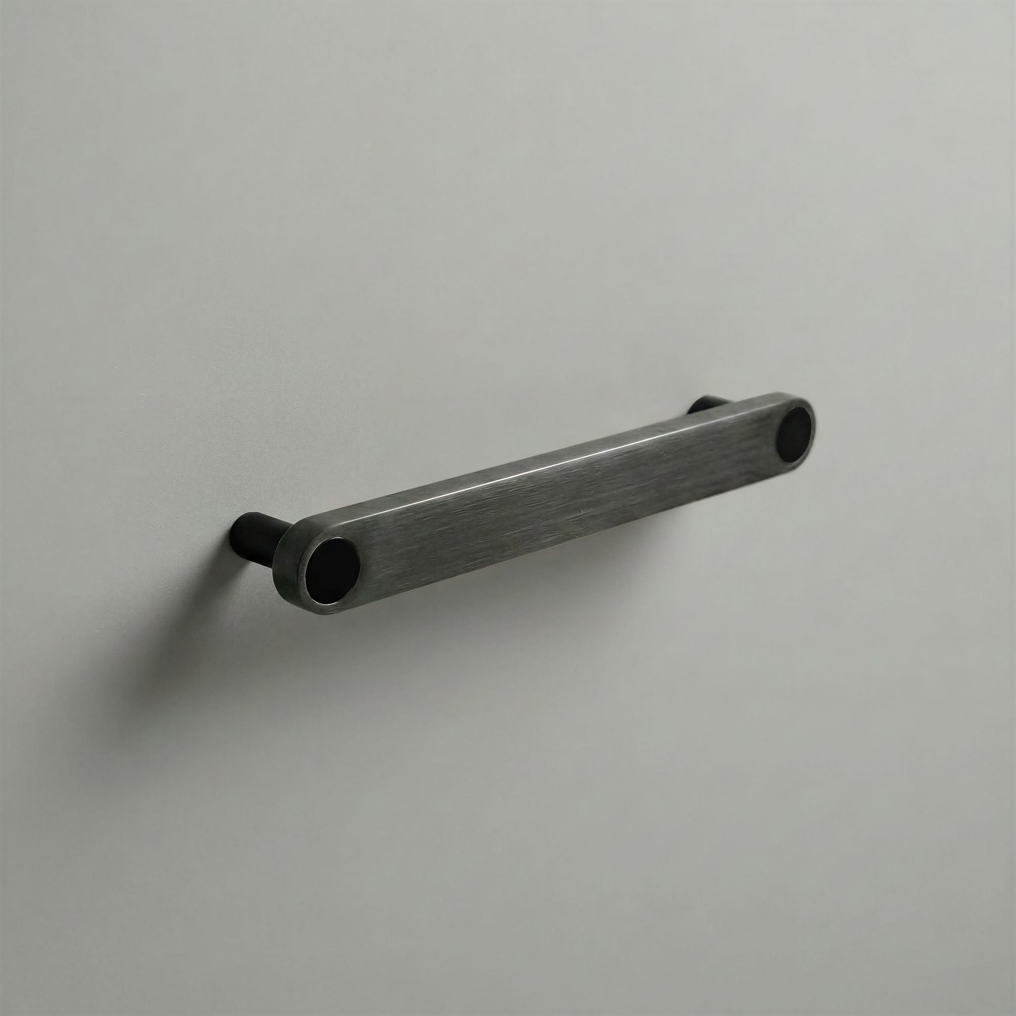 Gunmetal Ensemble Handle in 160mm Centres with Matte Black button detail by Sloan Roberts.