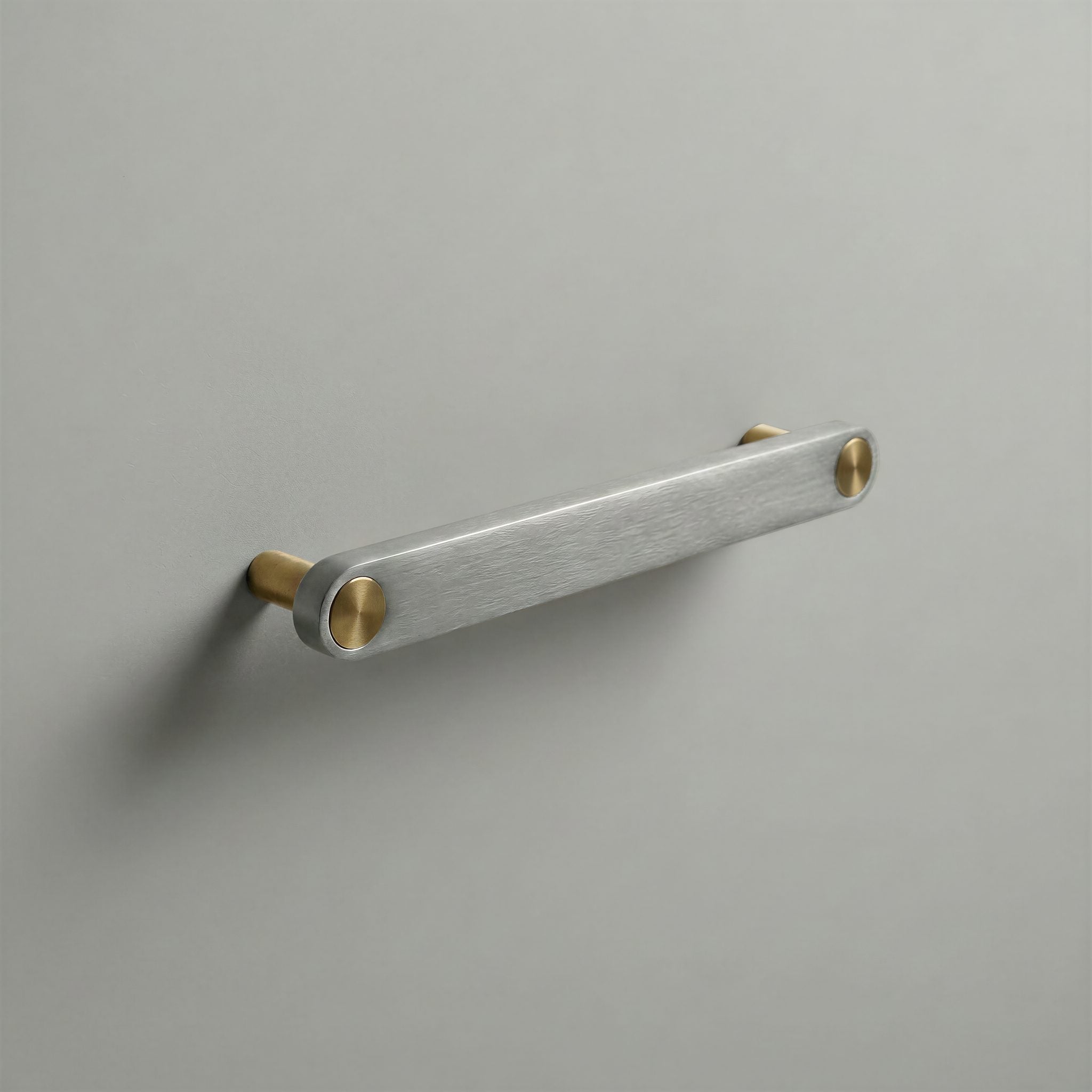 Brushed Steel Ensemble Handle in 160mm Centres with Brass button detail by Sloan Roberts.