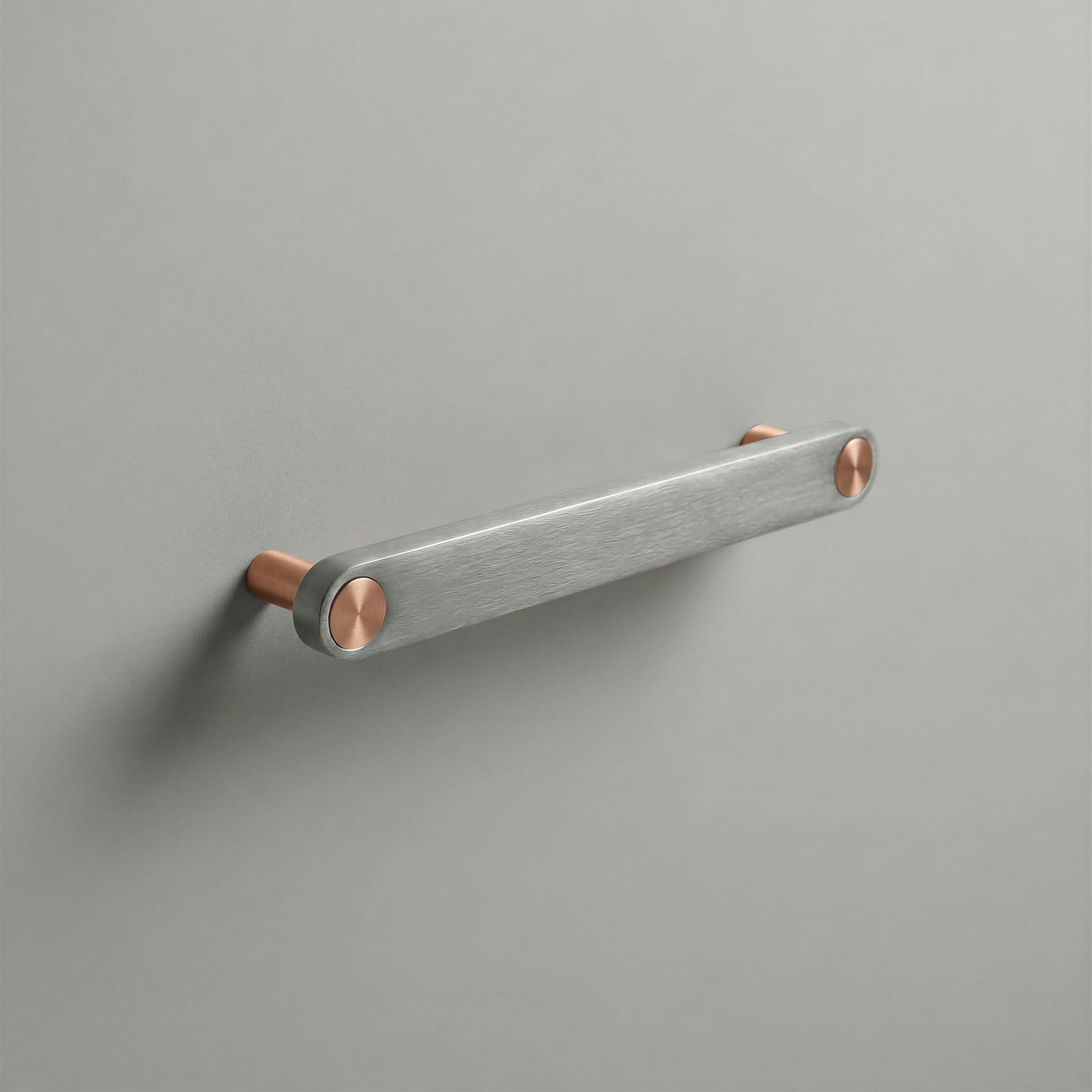 Brushed Steel Ensemble Handle in 160mm Centres with Brushed Copper button detail by Sloan Roberts.