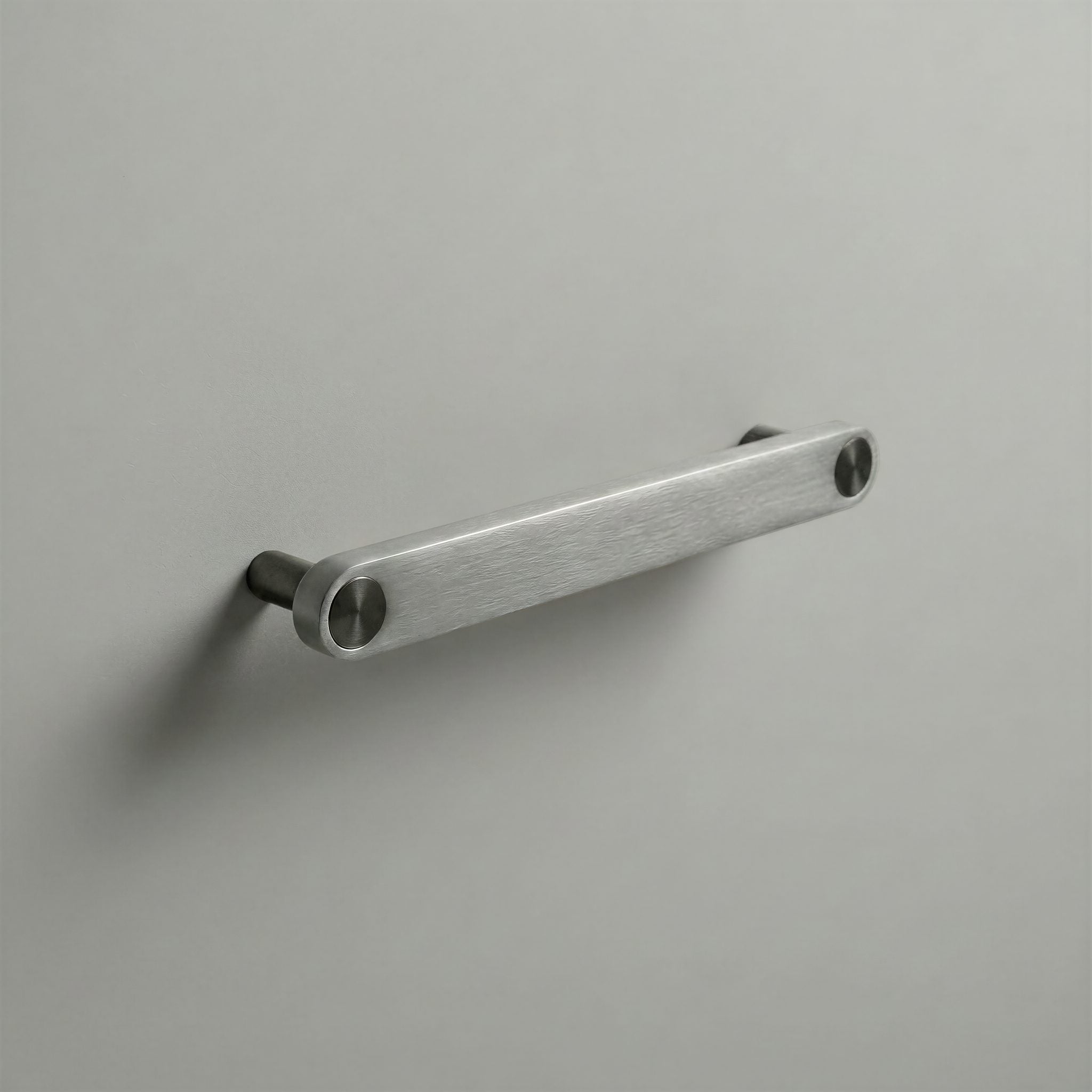Brushed Steel Ensemble Handle in 160mm Centres with Gunmetal button detail by Sloan Roberts.