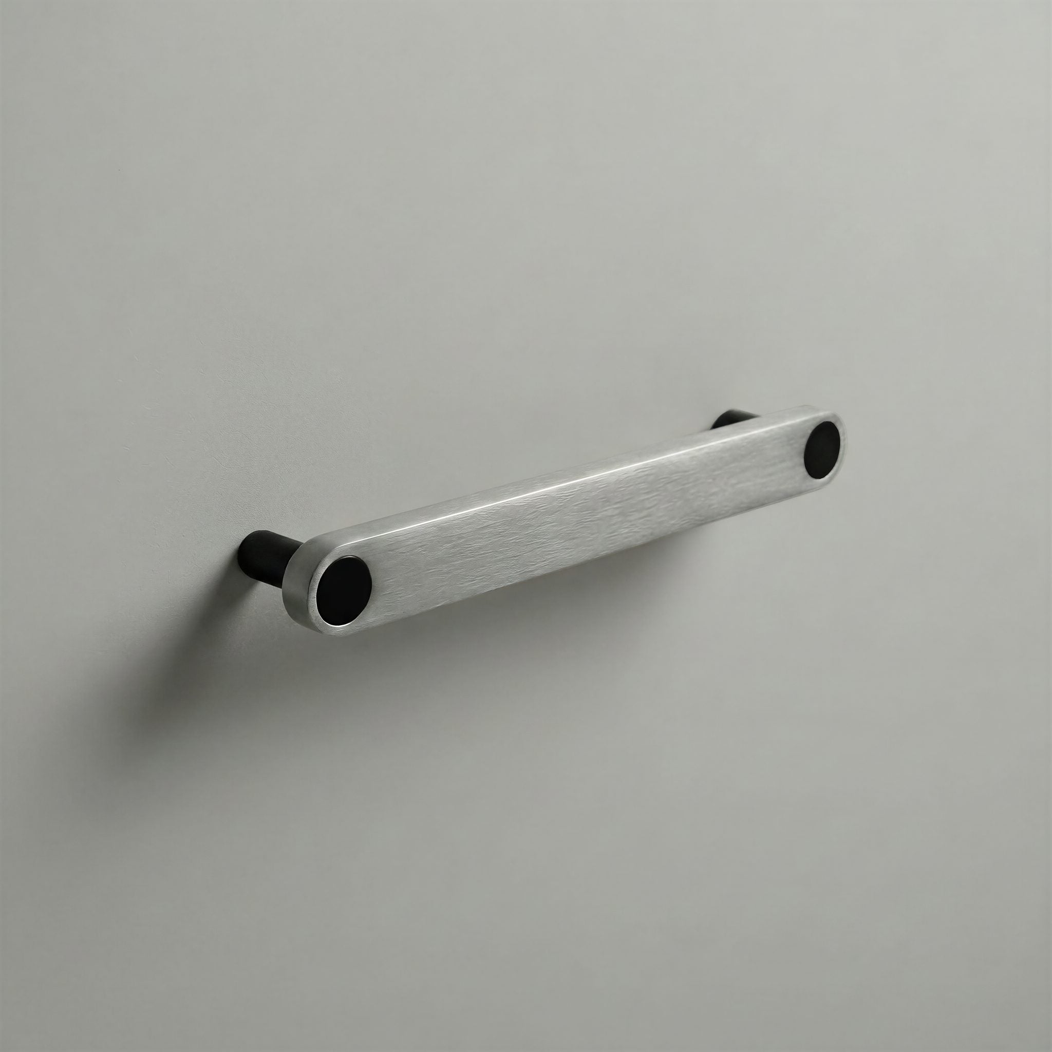 Brushed Steel Ensemble Handle in 160mm Centres with Matte Black button detail by Sloan Roberts.