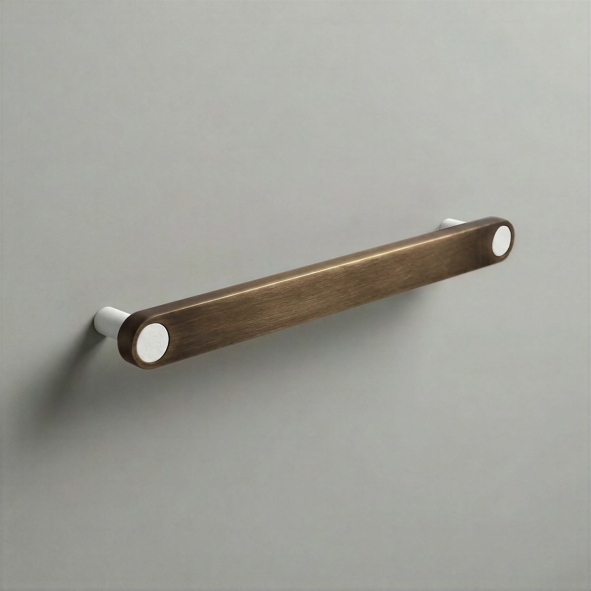 Aged Bronze Ensemble Handle in 192mm Centres with Matte White button detail by Sloan Roberts.