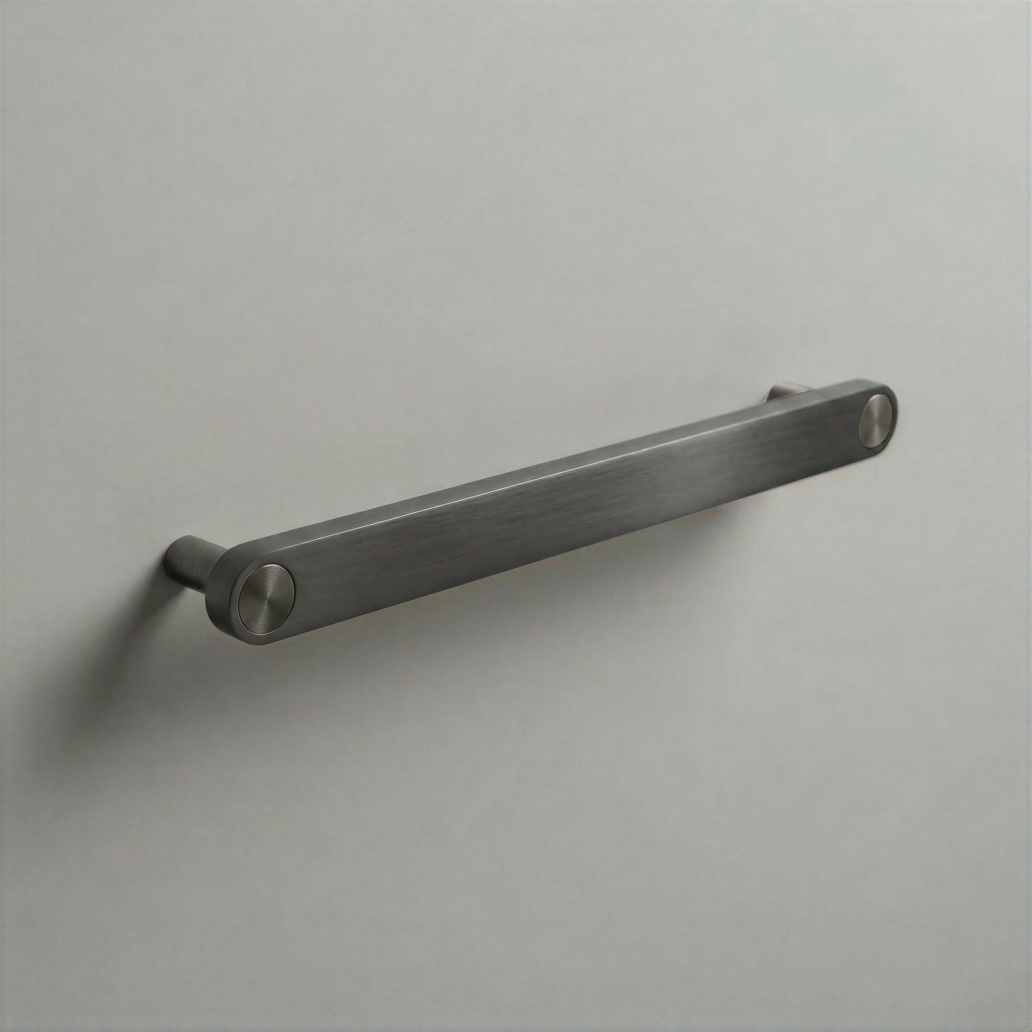 Gunmetal Ensemble Handle in 192mm Centres with Gunmetal button detail by Sloan Roberts.