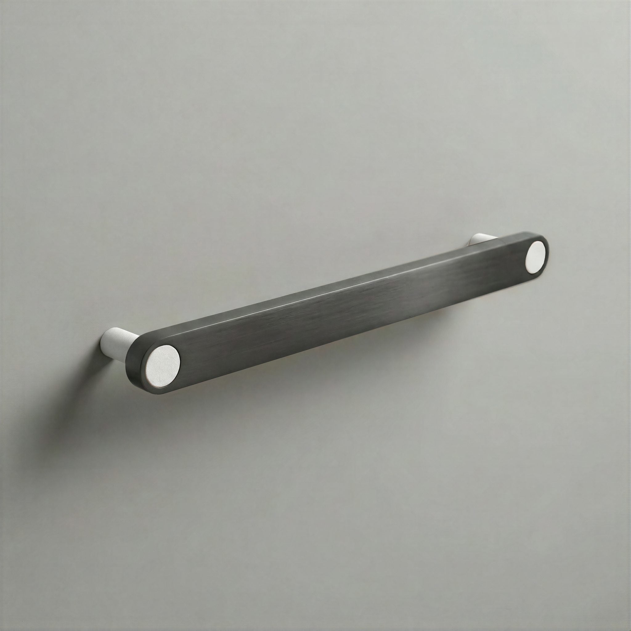 Gunmetal Ensemble Handle in 192mm Centres with Matte White button detail by Sloan Roberts.