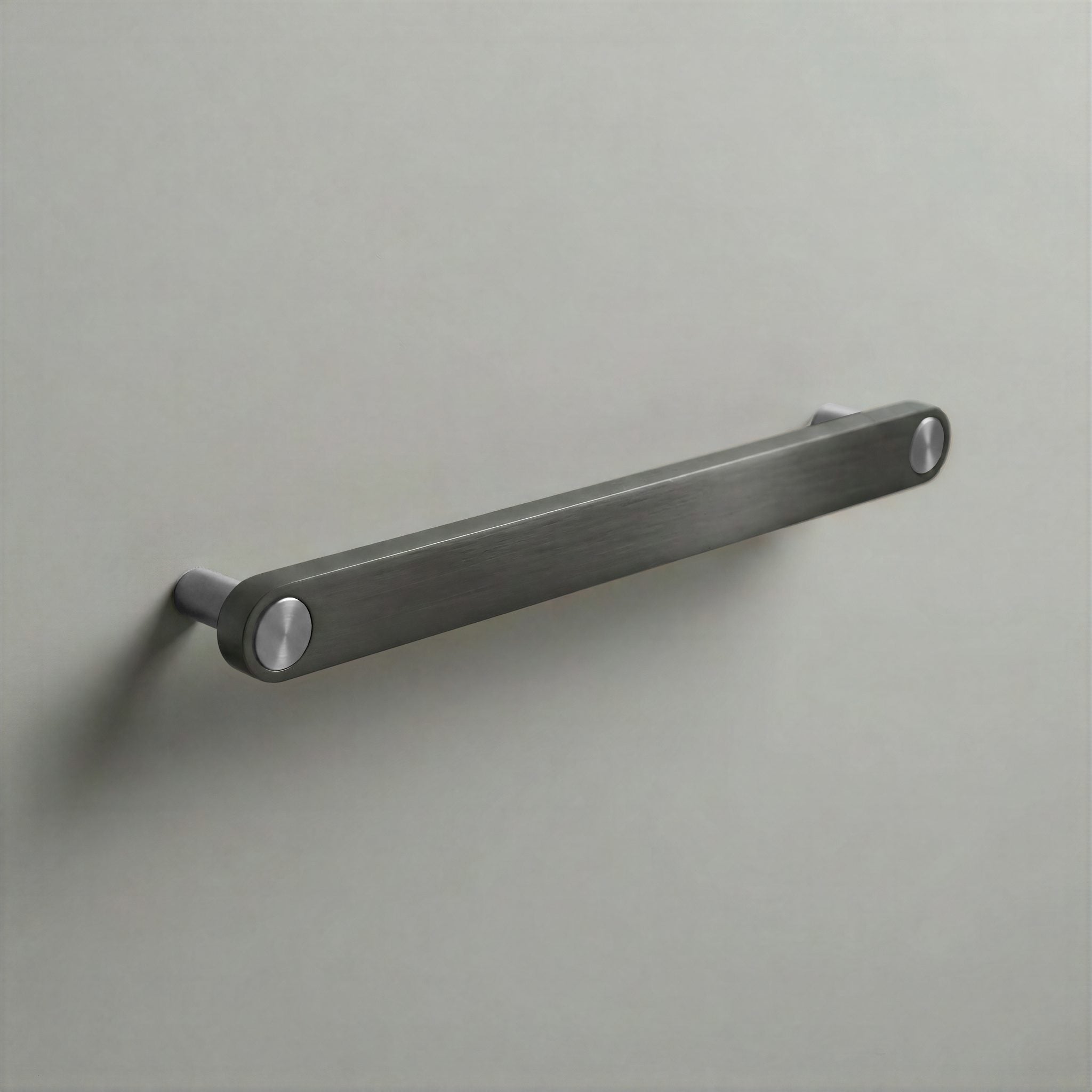 Gunmetal Ensemble Handle in 192mm Centres with Brushed Steel button detail by Sloan Roberts.