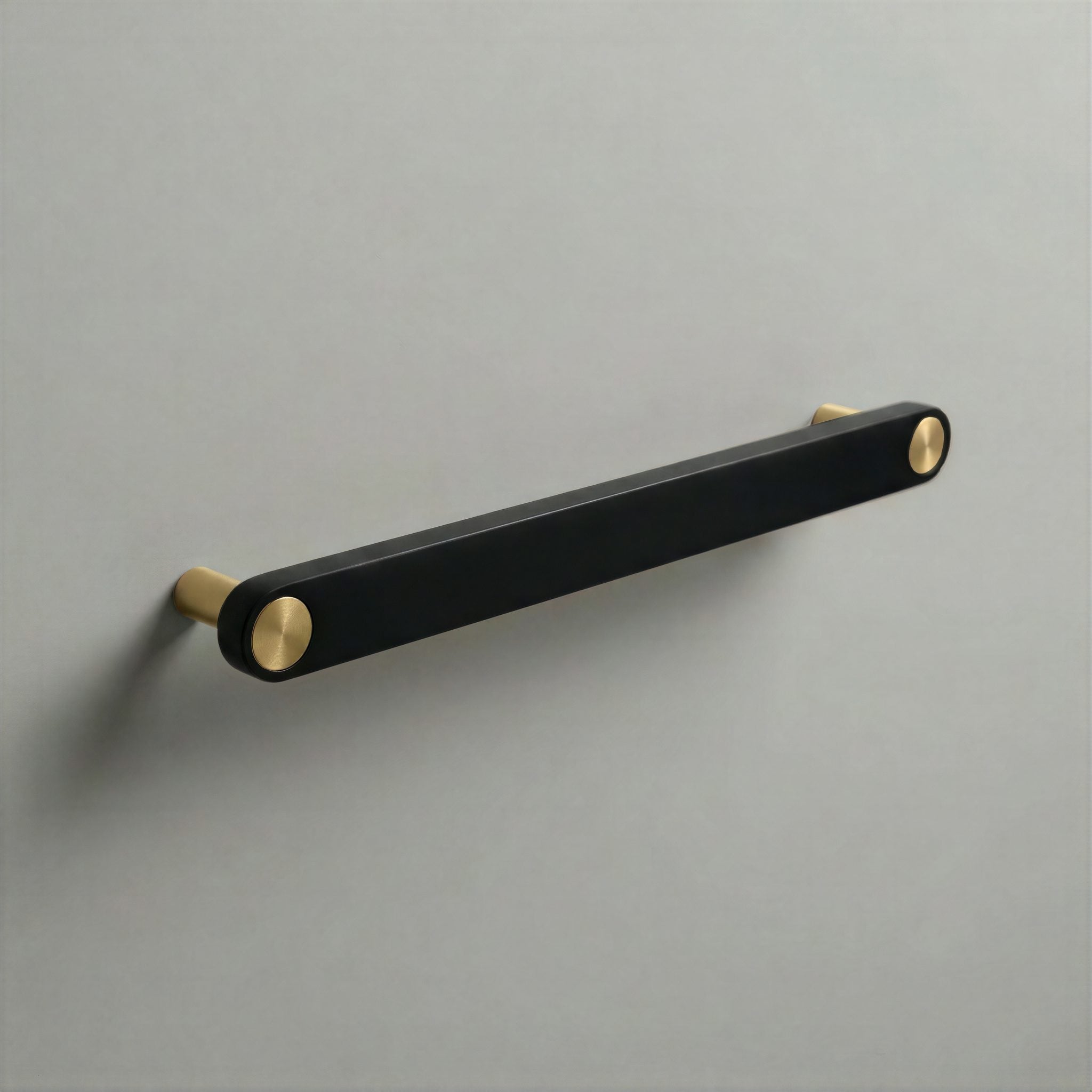 Matte Black Ensemble Handle in 192mm Centres with Brass button detail by Sloan Roberts.