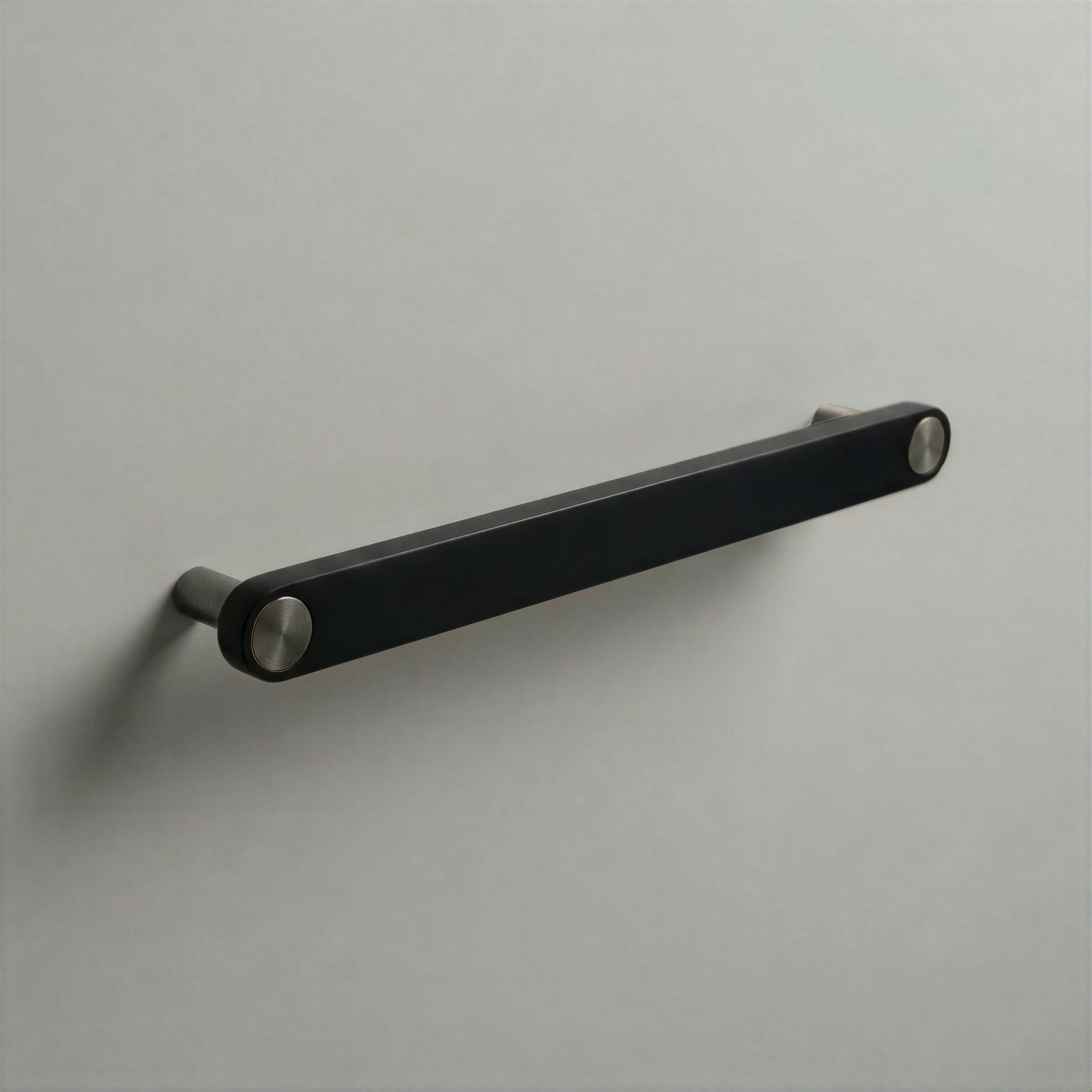 Matte Black Ensemble Handle in 192mm Centres with Gunmetal button detail by Sloan Roberts.