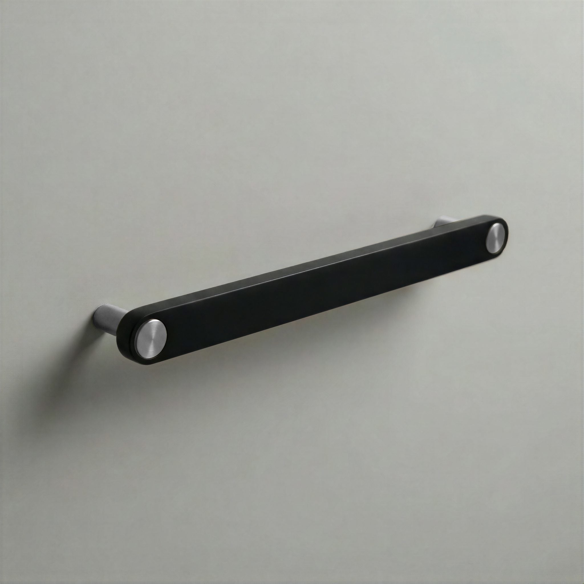 Matte Black Ensemble Handle in 192mm Centres with Brushed Steel button detail by Sloan Roberts.
