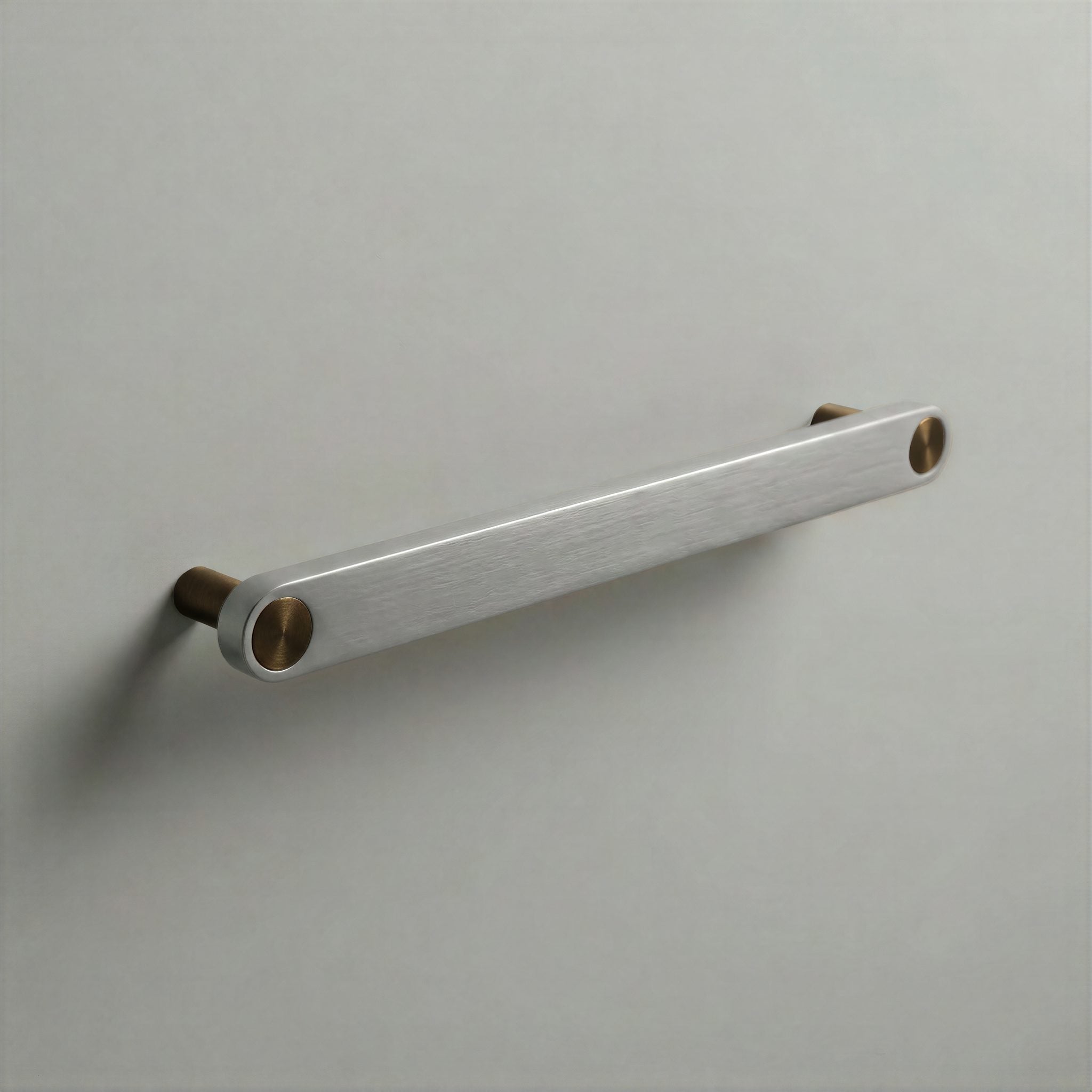 Brushed Steel Ensemble Handle in 192mm Centres with Aged Bronze button detail by Sloan Roberts.