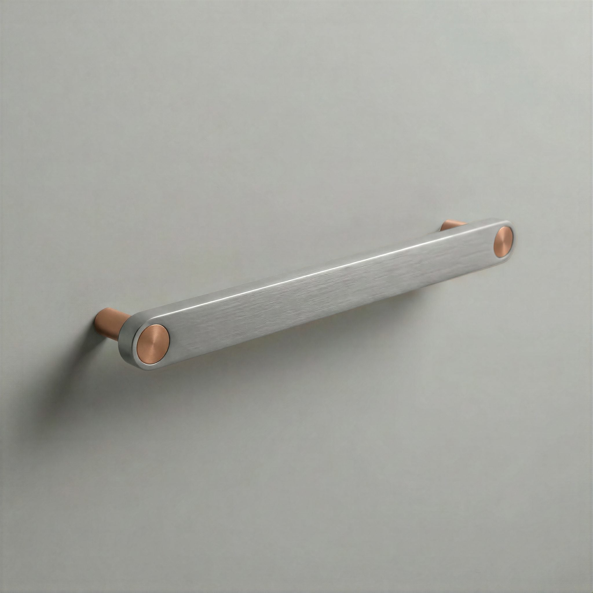 Brushed Steel Ensemble Handle in 192mm Centres with Brushed Copper button detail by Sloan Roberts.