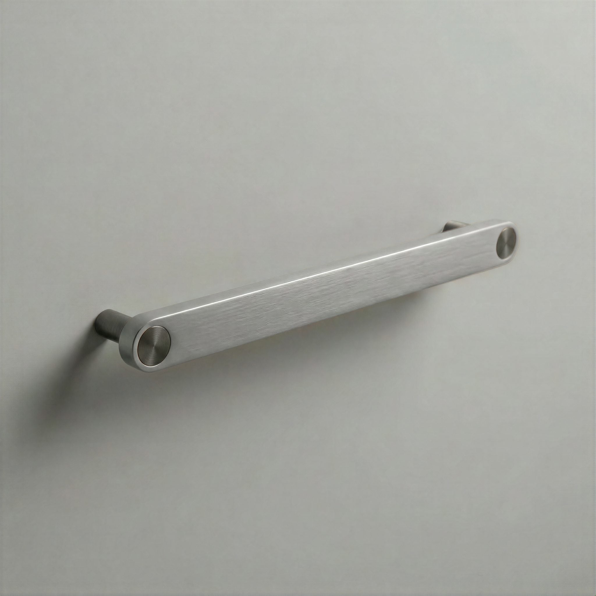 Brushed Steel Ensemble Handle in 192mm Centres with Gunmetal button detail by Sloan Roberts.