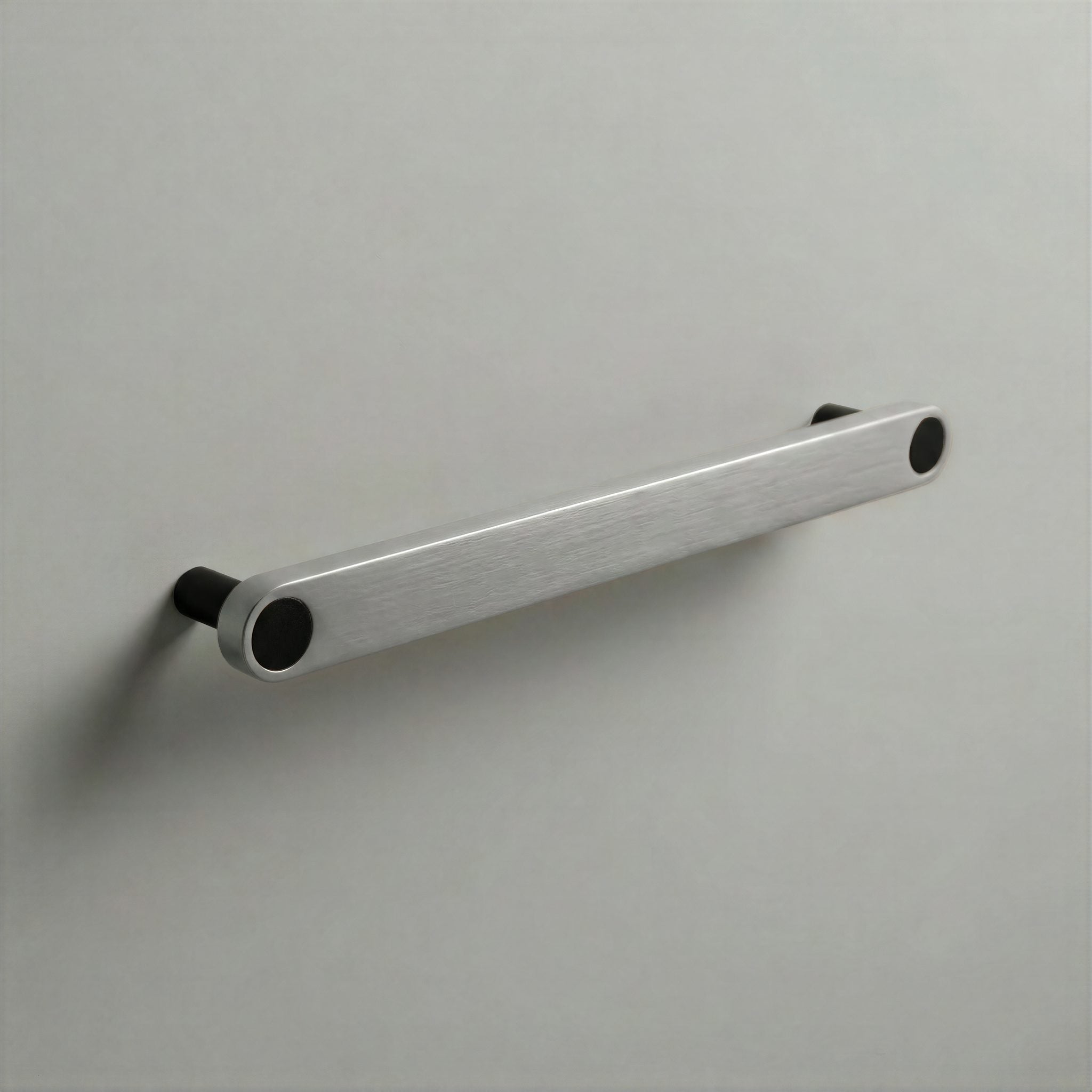 Brushed Steel Ensemble Handle in 192mm Centres with Matte Black button detail by Sloan Roberts.
