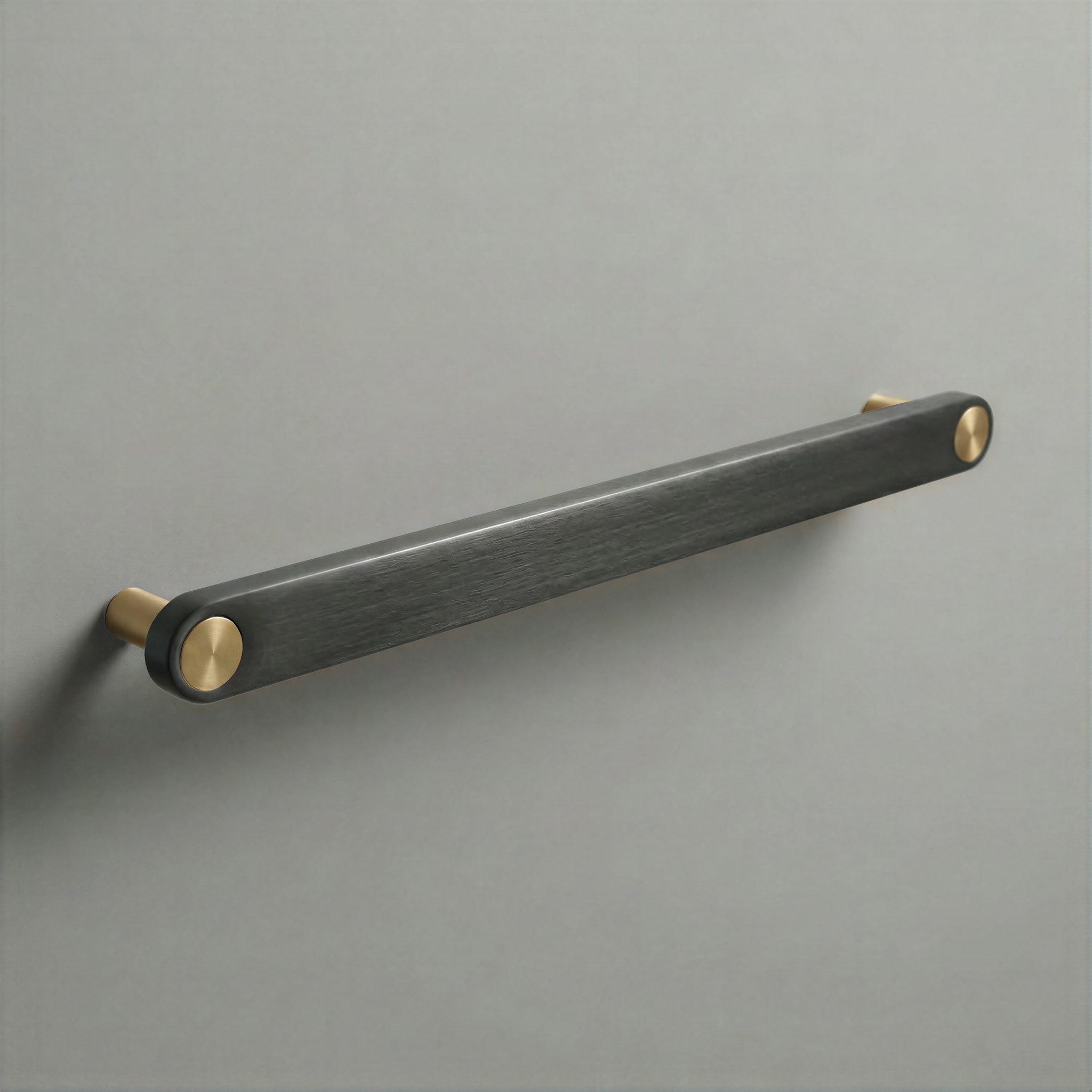Gunmetal Ensemble Handle in 224mm Centres with Brass button detail by Sloan Roberts.