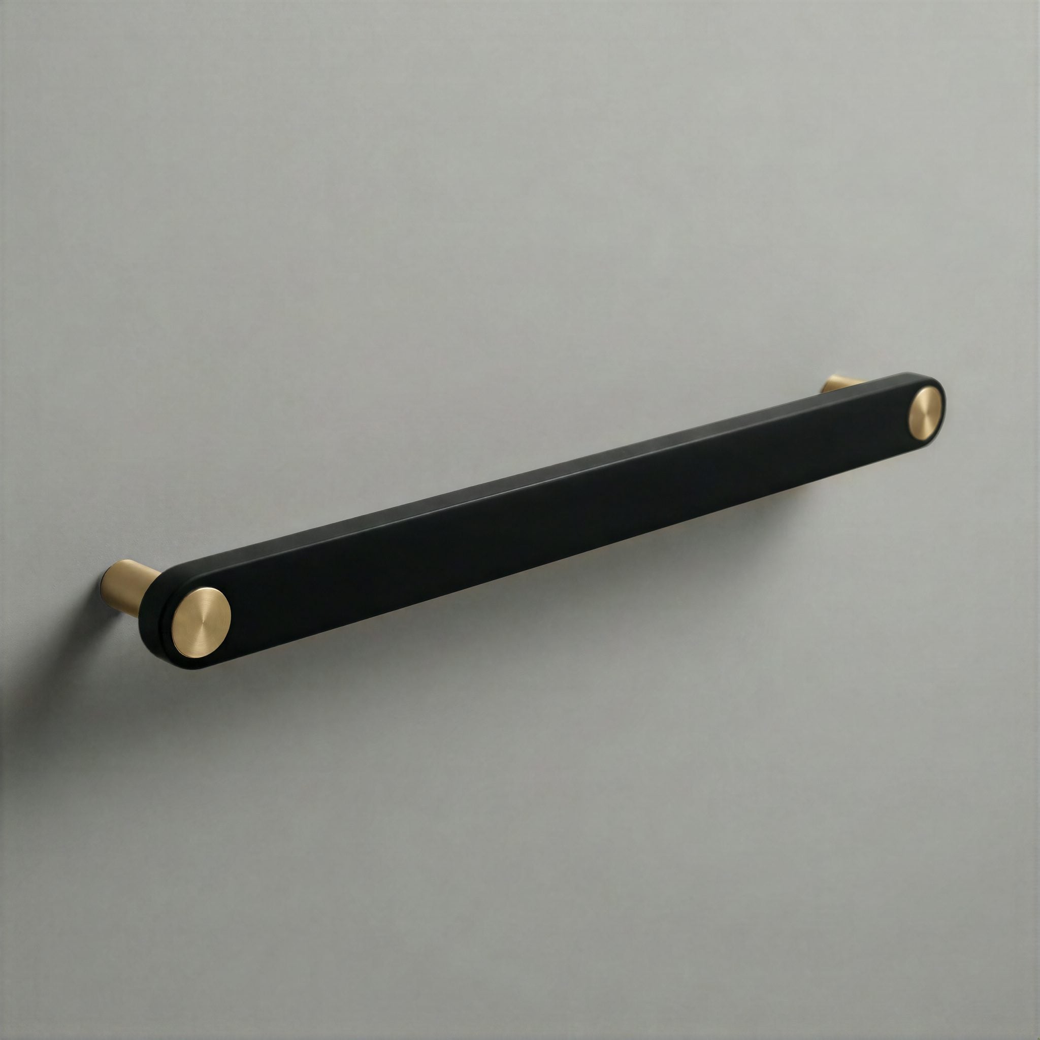 Matte Black Ensemble Handle in 224mm Centres with Brass button detail by Sloan Roberts.