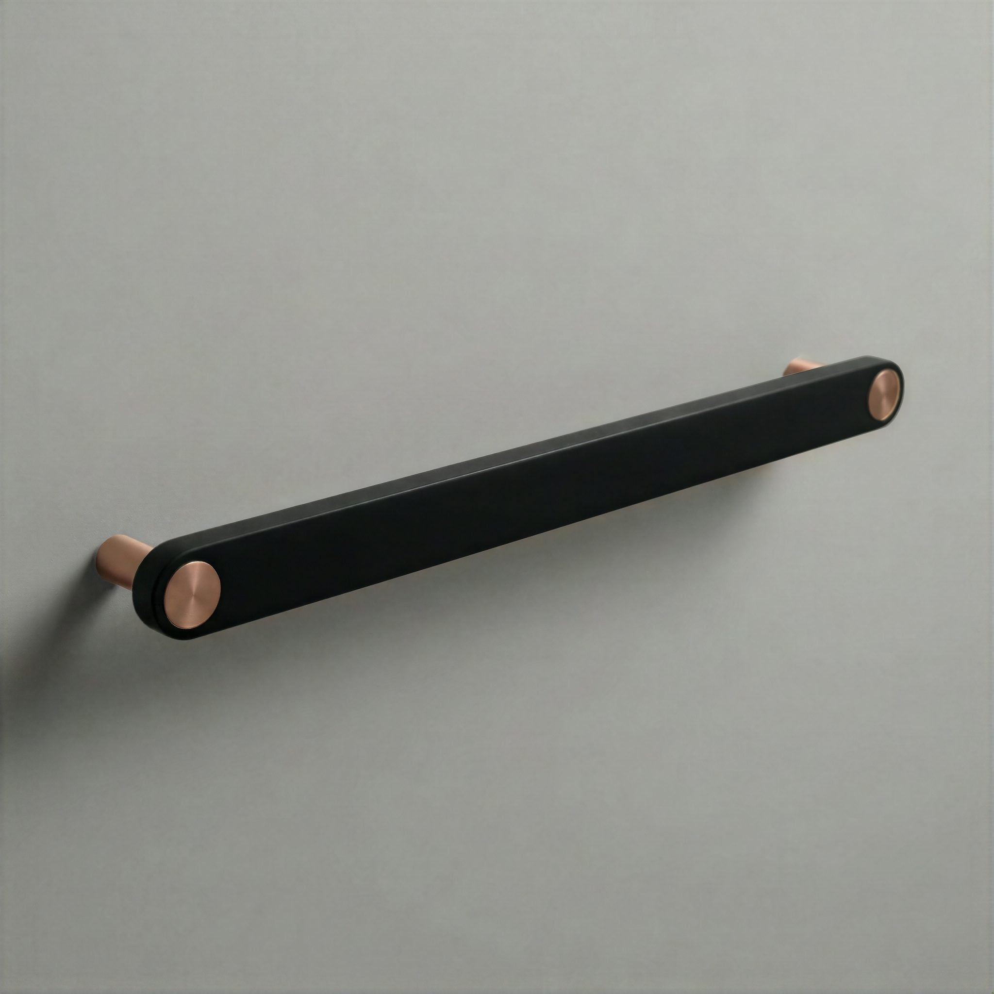Matte Black Ensemble Handle in 224mm Centres with Brushed Copper button detail by Sloan Roberts.