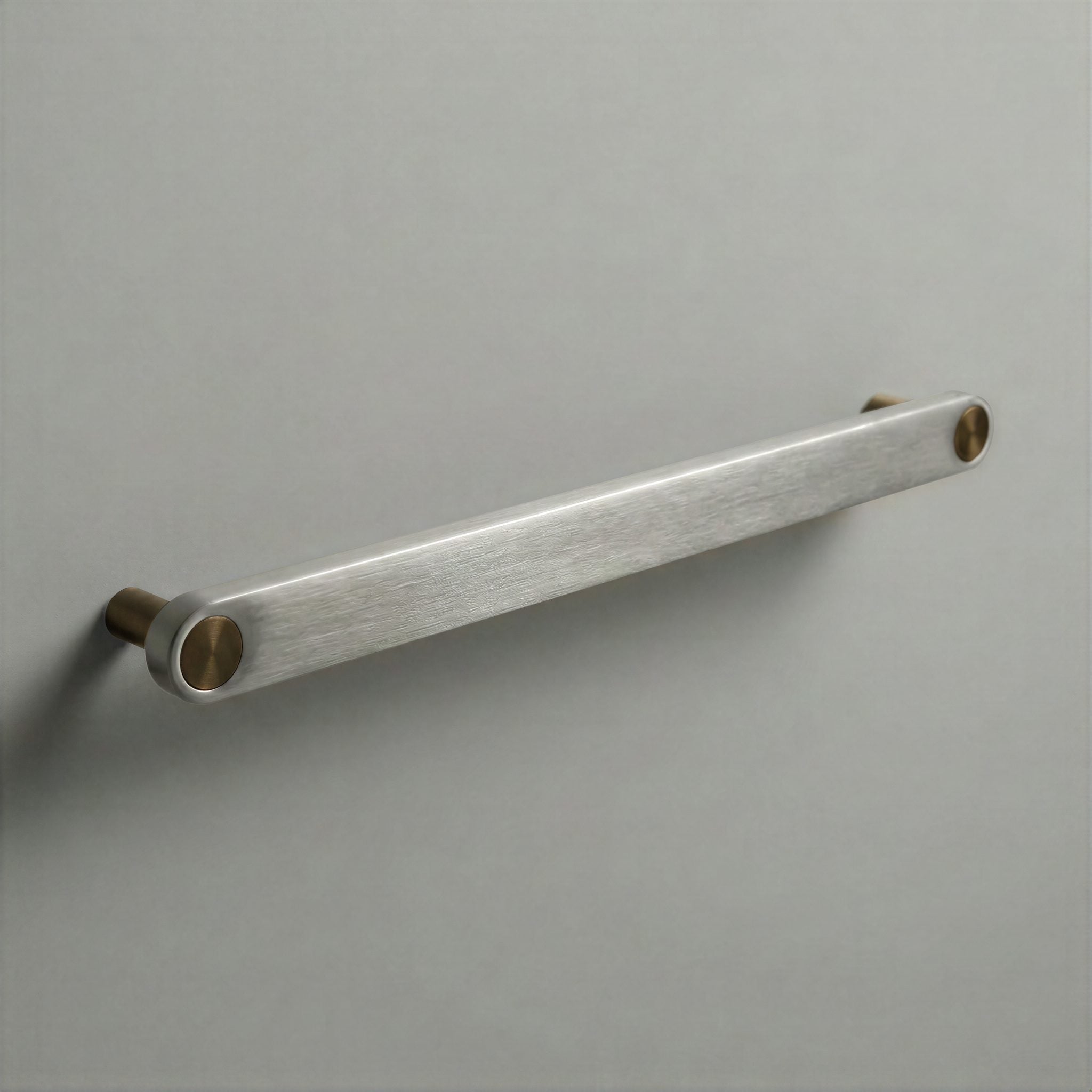 Brushed Steel Ensemble Handle in 224mm Centres with Aged Bronze button detail by Sloan Roberts.