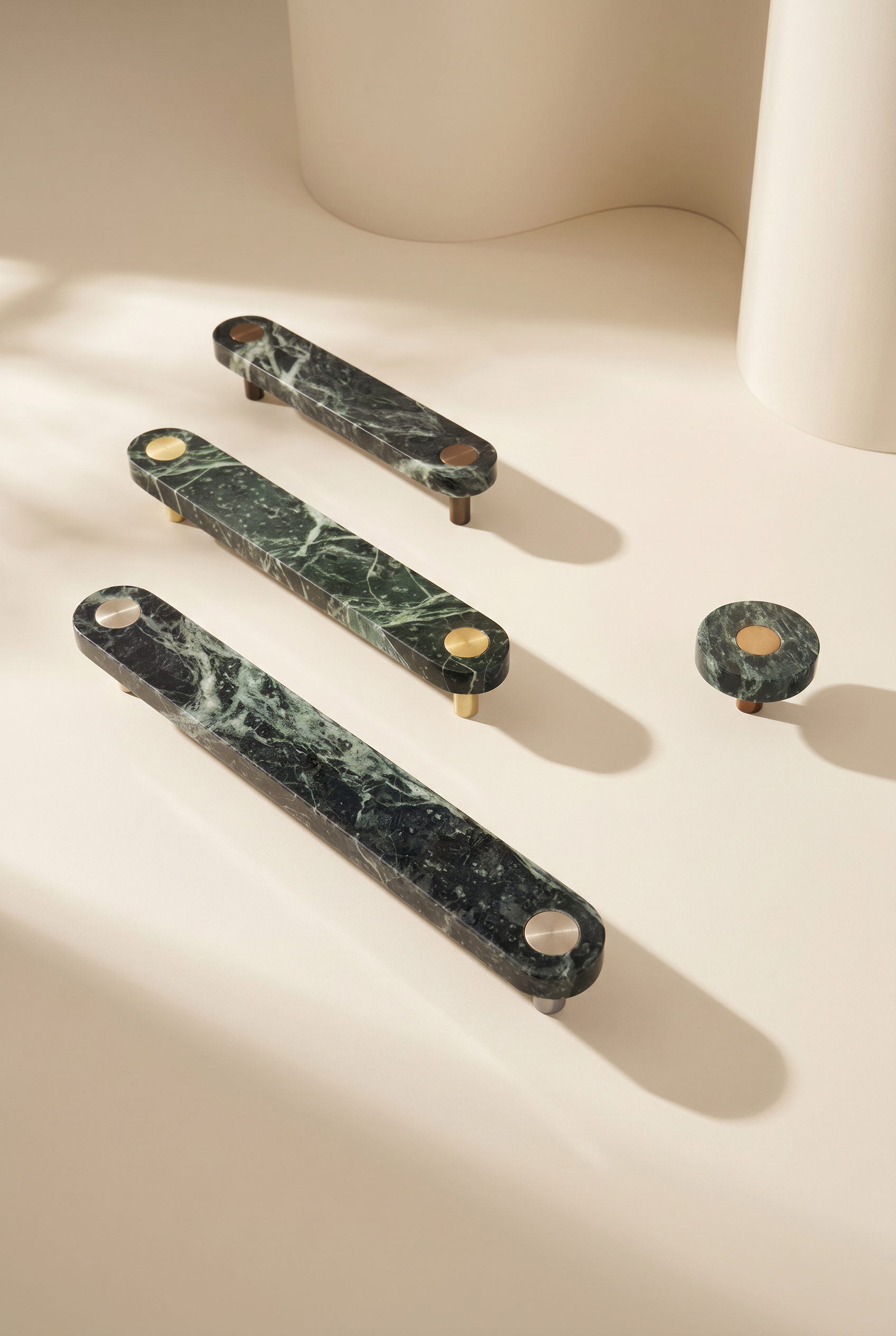 Ensemble Green Marble Handle — modular cabinet handle by Sloan Roberts. Crafted from Verde Alpi marble sourced from Italy with choice of metallic button detail. Designed and assembled in Melbourne.
