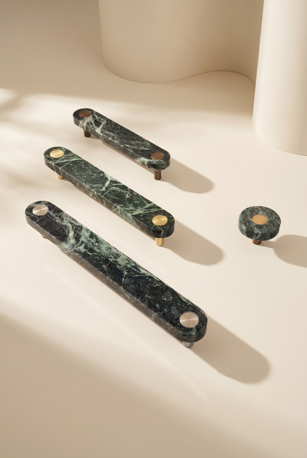 Ensemble Green Marble Handle — modular cabinet handle by Sloan Roberts. Crafted from Verde Alpi marble sourced from Italy with choice of metallic button detail.